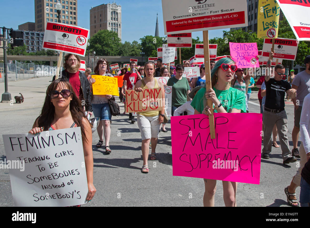 Detroit, Michigan, USA. Protesters marched to the Hilton Doubletree Hotel to demand cancellation of a 'men's rights' conference organized by 'A Voice for Men.' The protesters said that such 'Mens Rights Activism' groups are misogynist and create a climate that leads to violence against women. Credit:  Jim West/Alamy Live News Stock Photo
