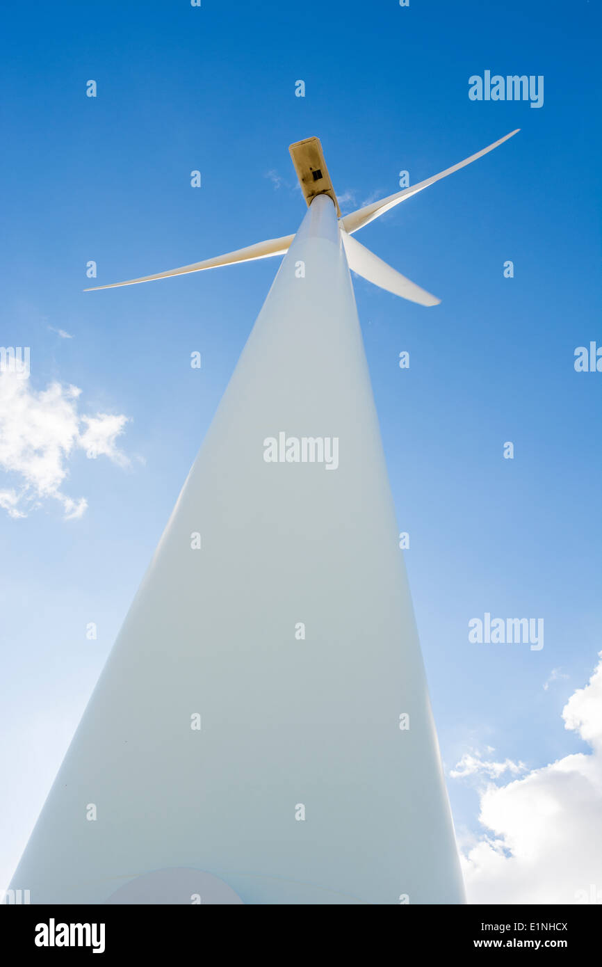 Wind turbine with a blue sky in the background Stock Photo - Alamy