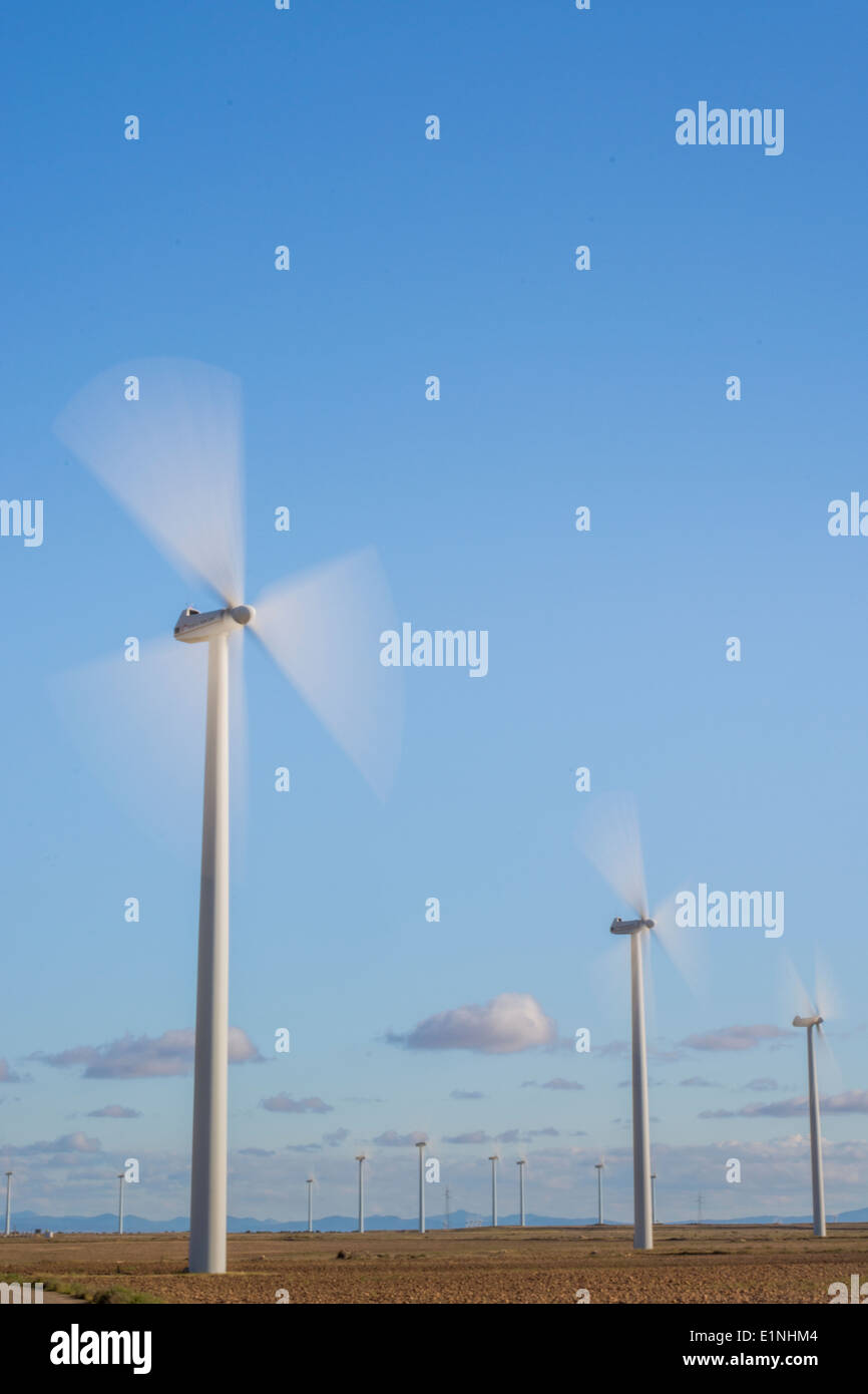 Wind turbine with a blue sky in the background Stock Photo - Alamy