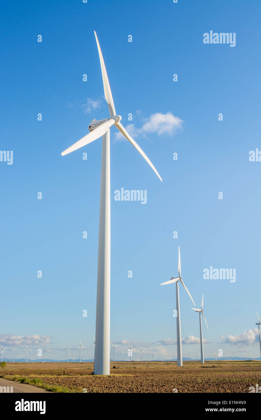 Wind turbine with a blue sky in the background Stock Photo - Alamy