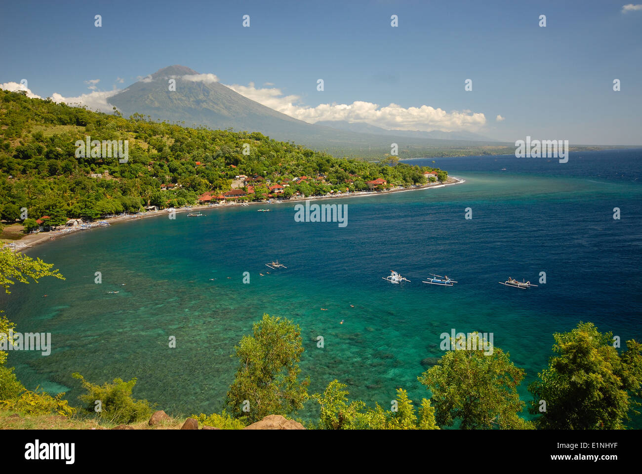 view at the bay of Amed on Bali with vulcano Gunung Agung in the back Stock Photo