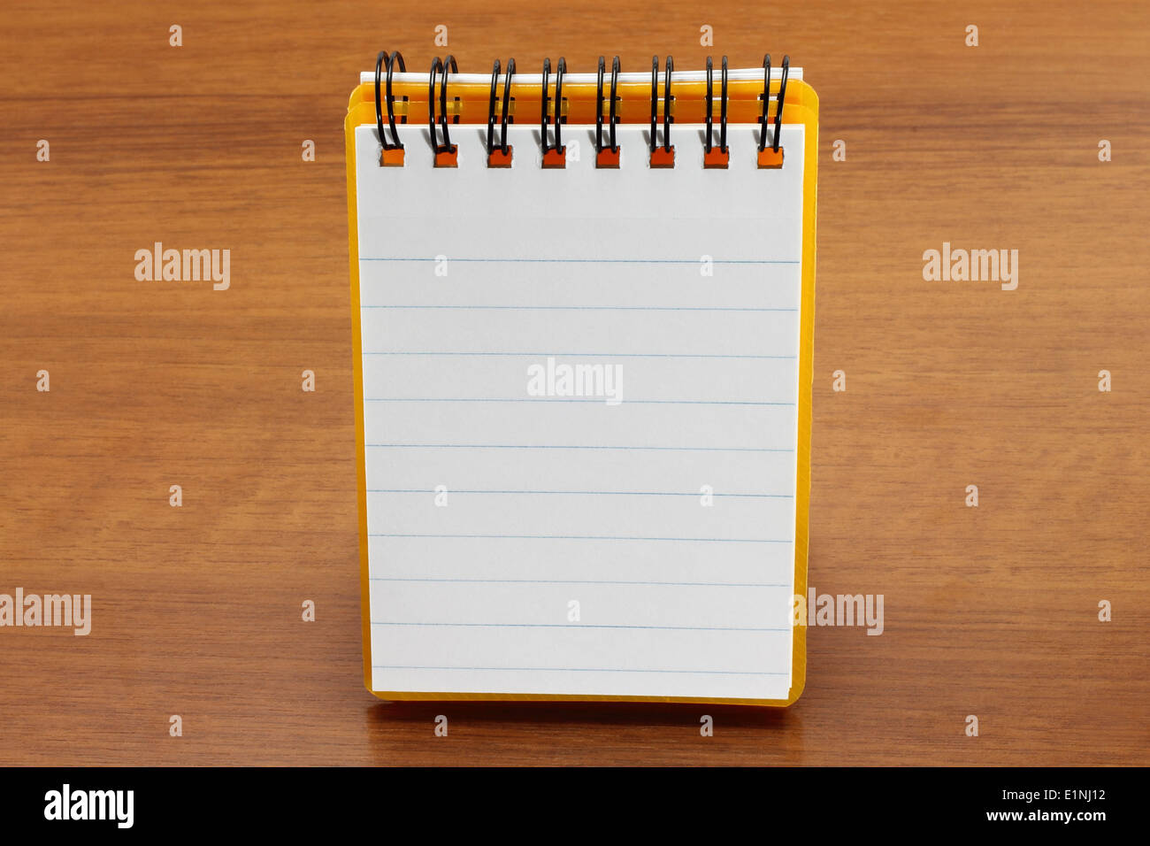 White blank notebook on a wood background Stock Photo - Alamy