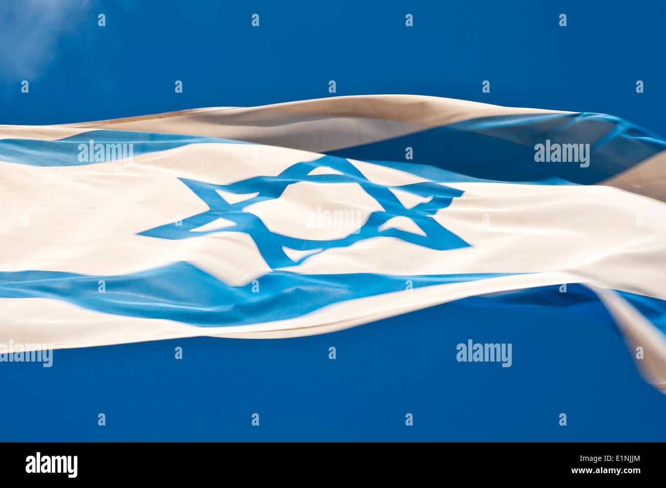 Israeli flag in the wind Stock Photo