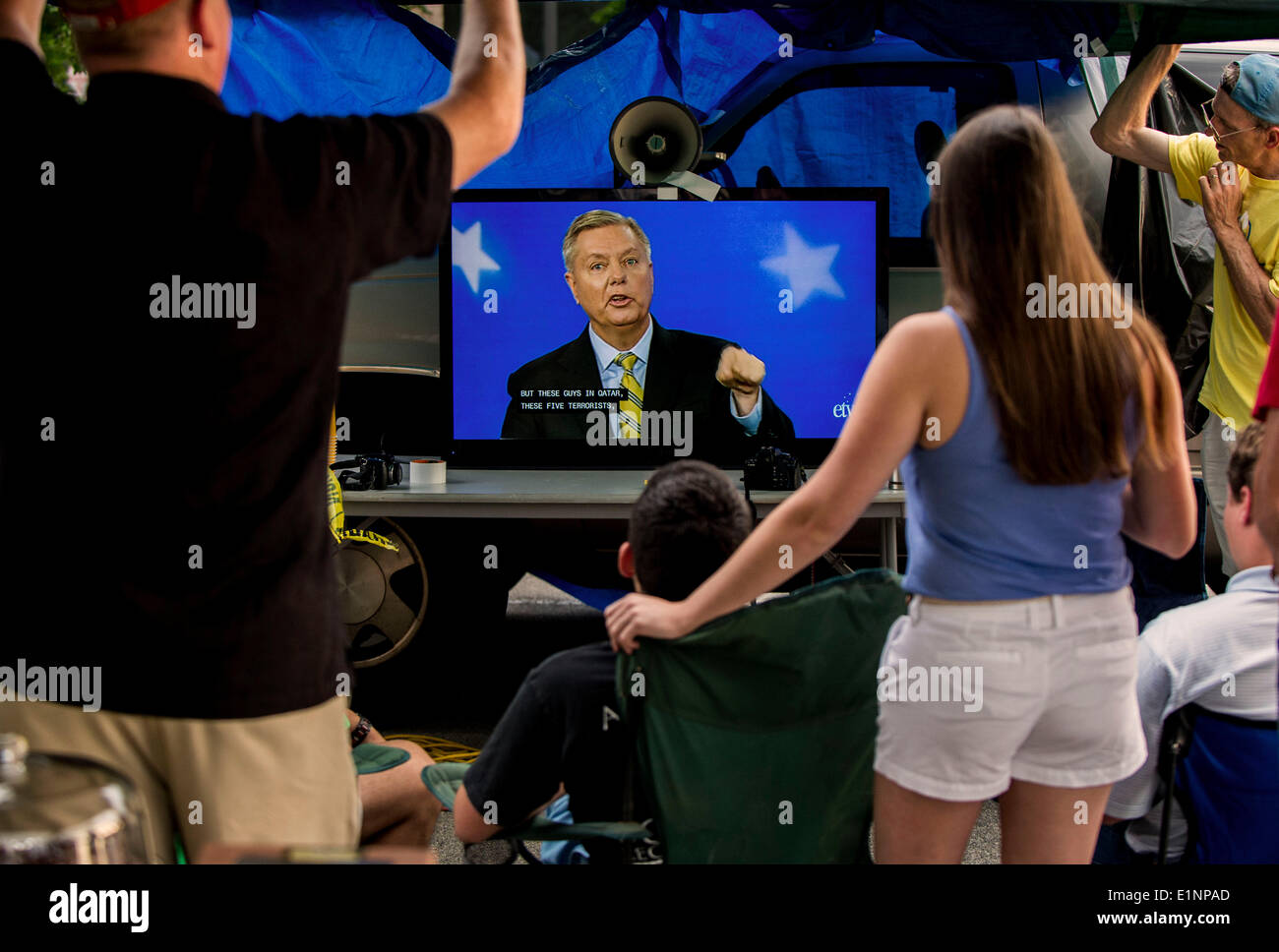 Columbia, South Carolina, USA. 07th June, 2014. Supporters of candidate Lee Bright watch the South Carolina Republican Senate Primary debate in a tent they set up outside the studios of South Carolina Educational Television. Credit:  Brian Cahn/ZUMAPRESS.com/Alamy Live News Stock Photo