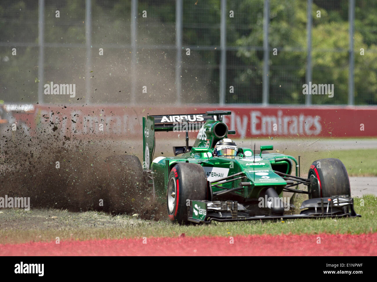 Montreal, Canada. 7th June, 2014. Caterham Formula One driver Kamui Kobayashi of Japan goes off the track during the qualifying session of 2014 Canadian Formula One Grand Prix at the Circuit Gilles Villeneuve in Montreal, Canada, on June 7, 2014. Credit:  Andrew Soong/Xinhua/Alamy Live News Stock Photo