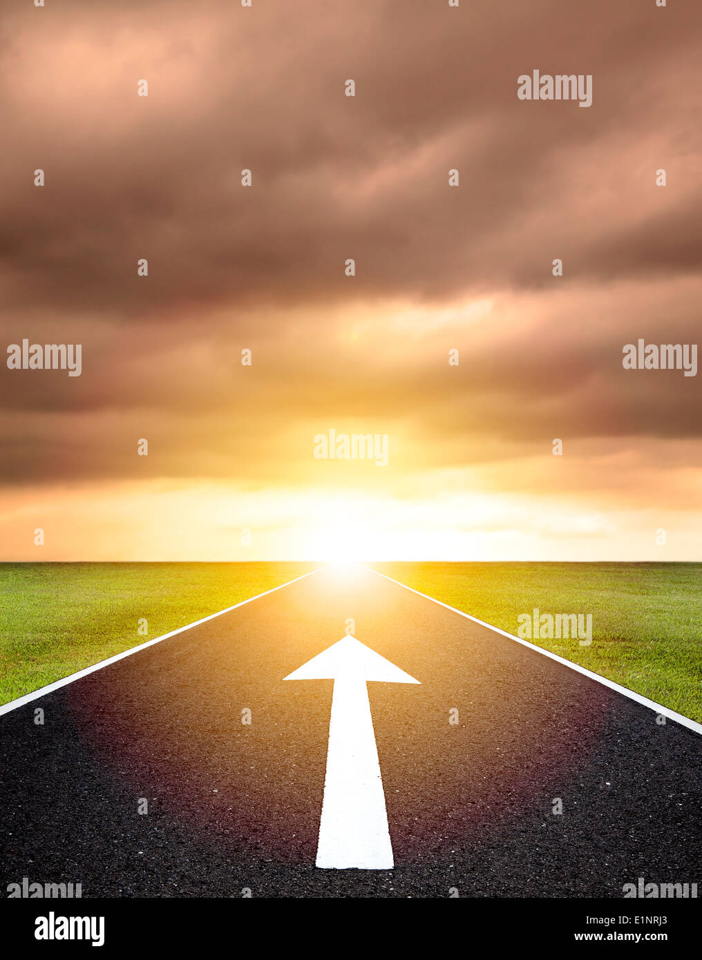 the ahead arrow on the asphalt road and sunset background Stock Photo ...