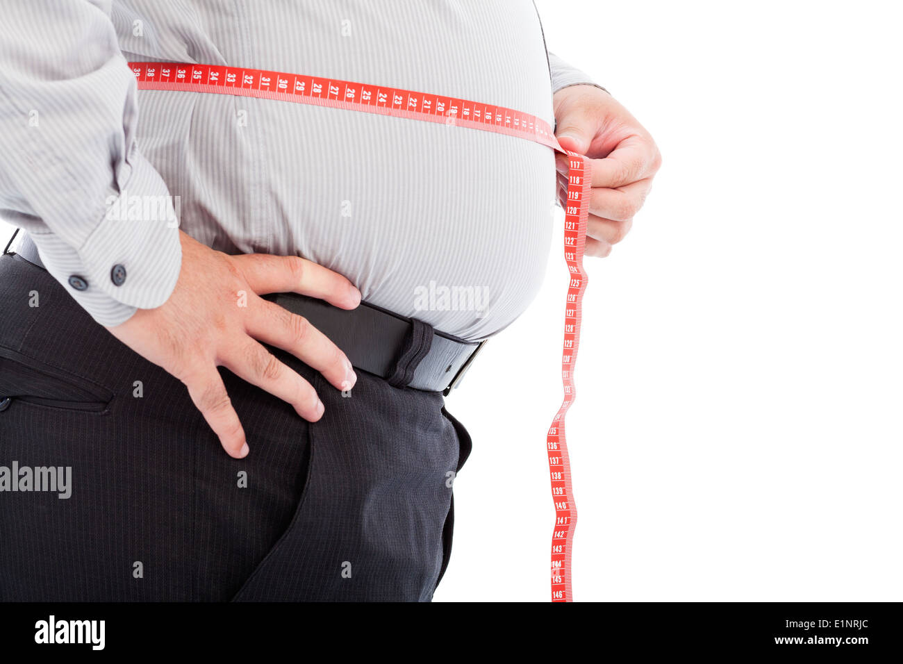 fat business man use scale to measure his waistline Stock Photo