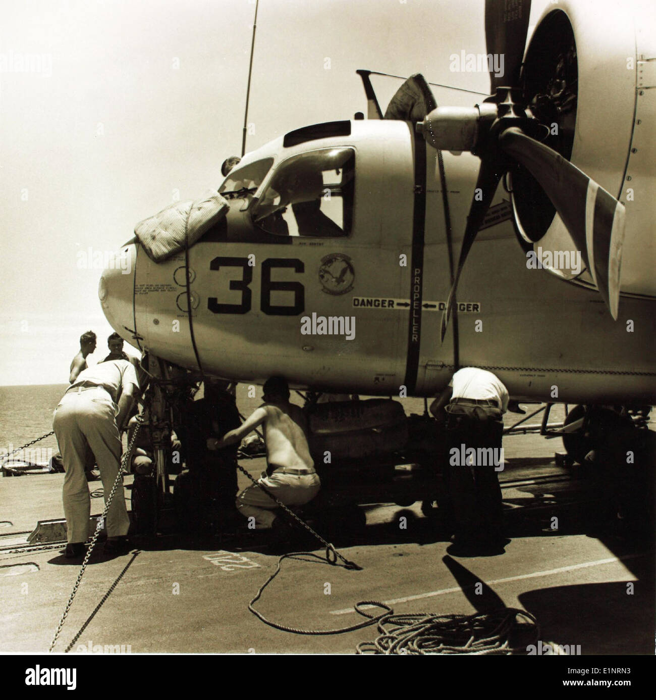 This image documents a Grumman S2F Tracker aircraft involved in an ...
