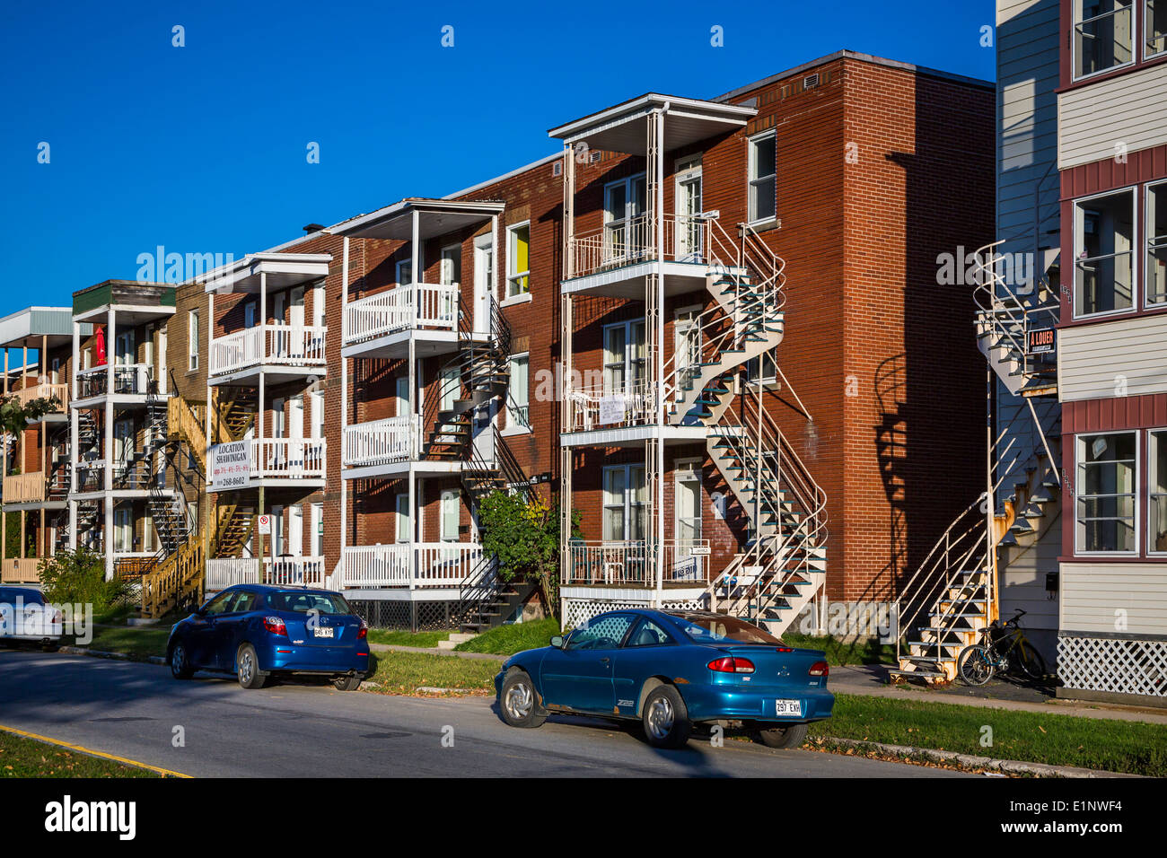 Three story apartment blocks on a street in Shawinigan, Quebec, Canada