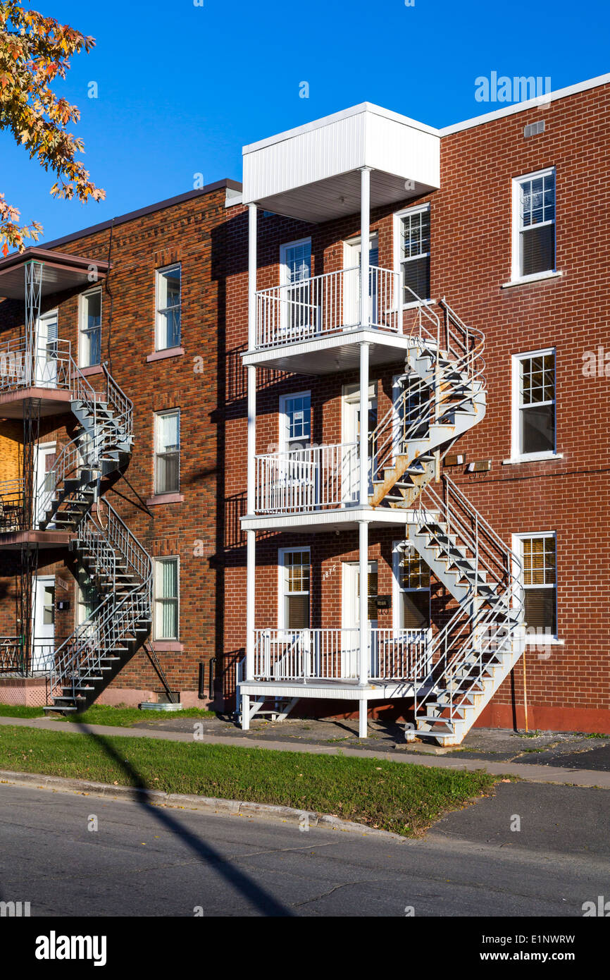 Three story apartment blocks on a street in Shawinigan, Quebec, Canada