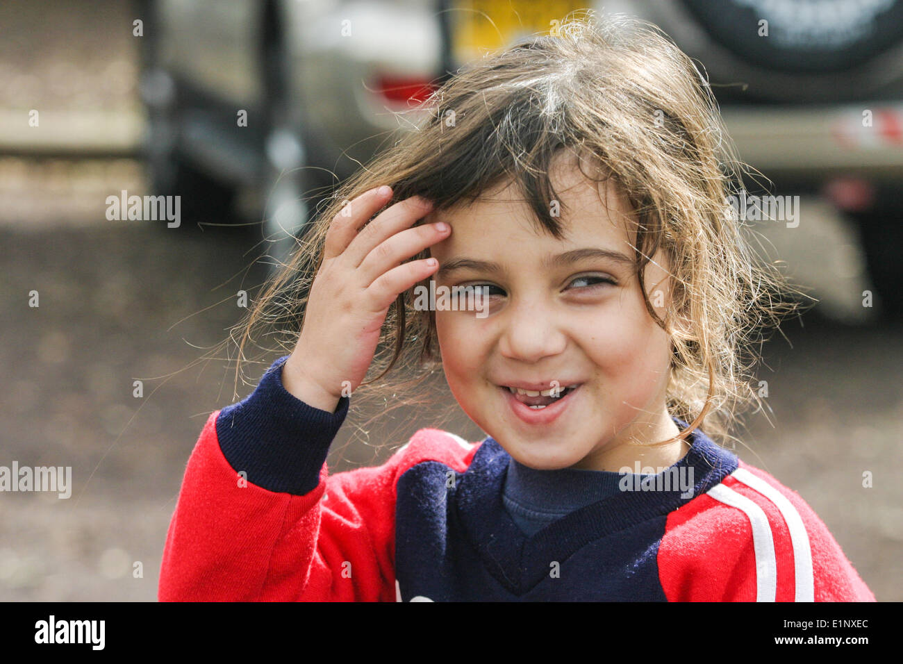 Portrait of a young smiling 4 year old girl. Model release available Stock Photo