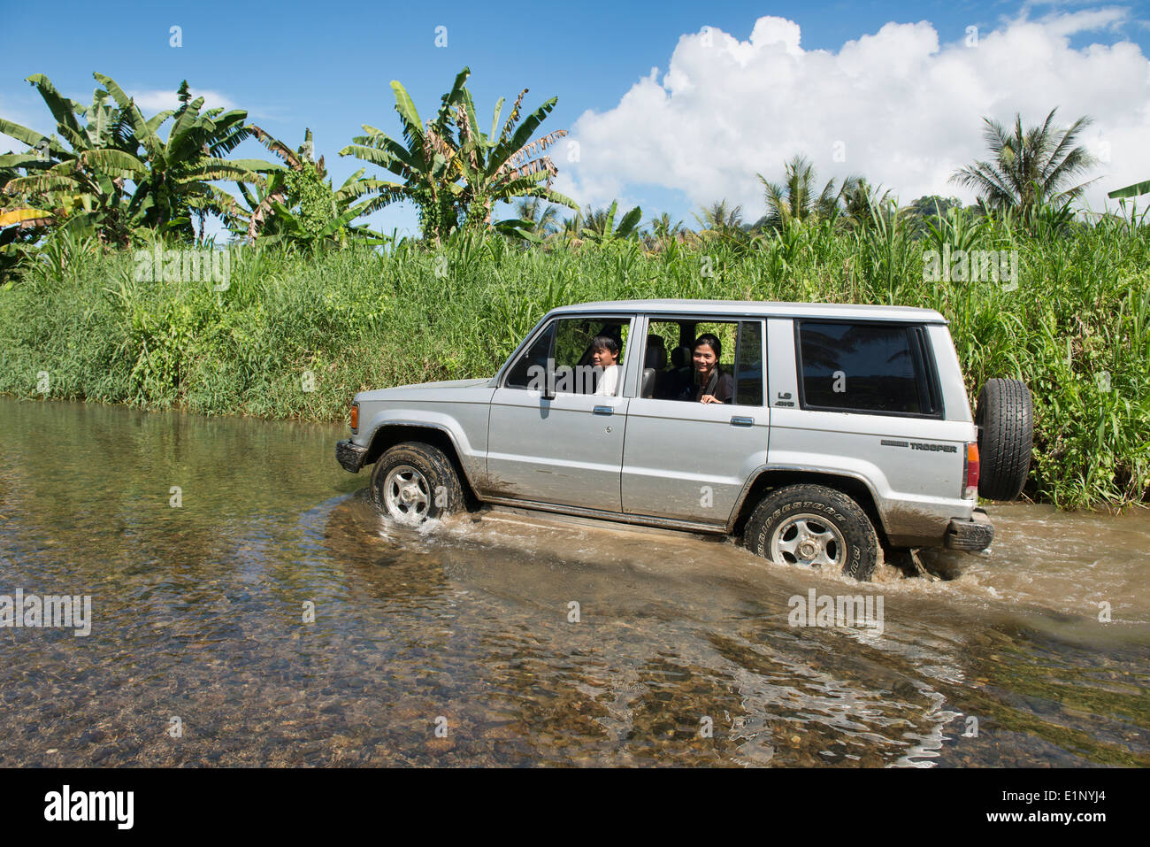 jeep navigating river crossing to Sukamade Beach, Meru Betiri National Park, Java, Indonesia Stock Photo