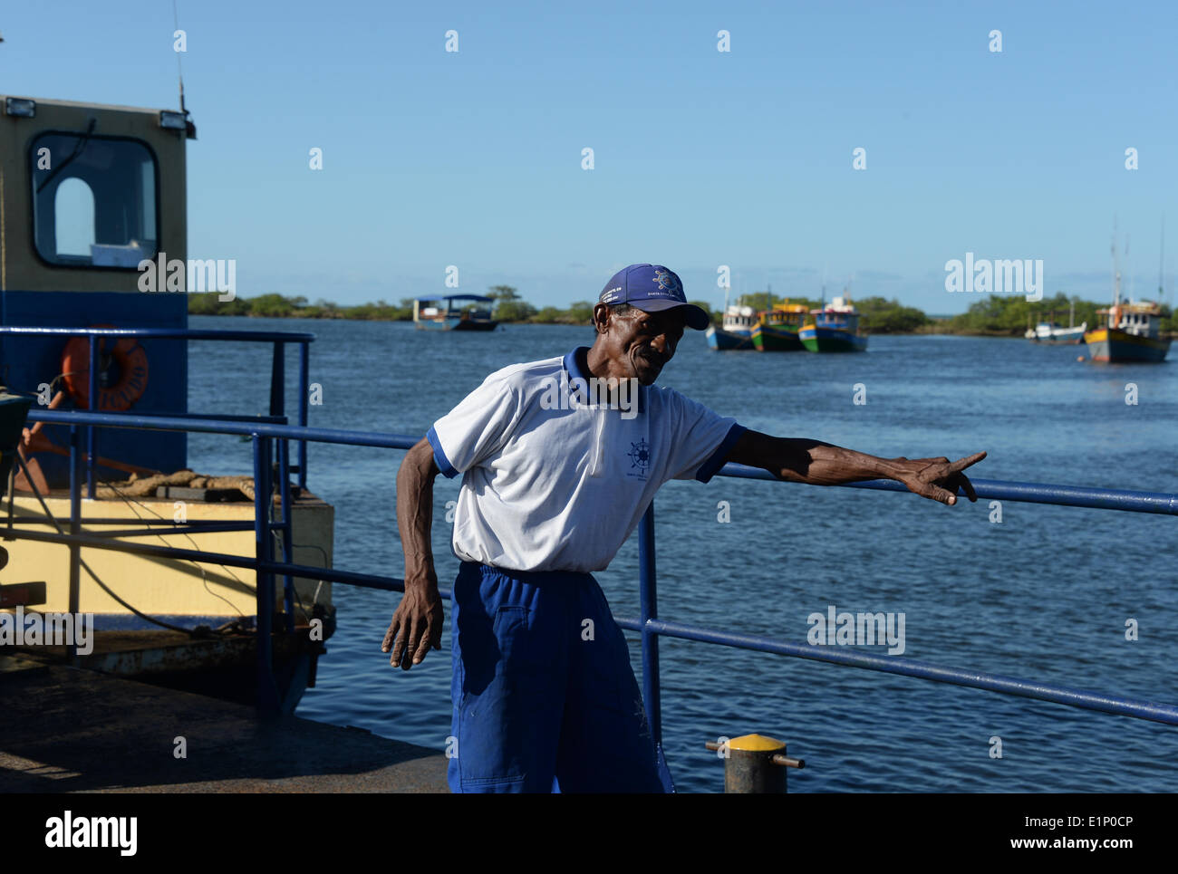 Santo Andre, Brazil. 07th June, 2014. Ferryman Manuel gives directions to passengers on a ferry from Santa Cruz Cabralia to Santo Andre, Brazil, 07 June 2014. The FIFA World Cup will take place in Brazil from 12 June to 13 July 2014. Photo: Marcus Brandt/dpa/Alamy Live News Stock Photo