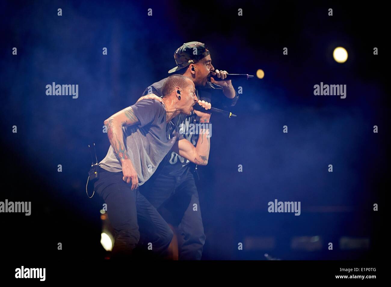 Nuerburg, Germany. 07th June, 2014. Frontman of the US american crossover band Linkin Park Chester Bennington (L) and Mike Shinoda perform at the rock music festival 'Rock am Ring' at Nuerburgring motorsports complex in Nuerburg, Germany, 07 June 2014. 'Rock am Ring' takes place for 29th and last time. Photo: Thomas Frey/dpa/Alamy Live News Stock Photo
