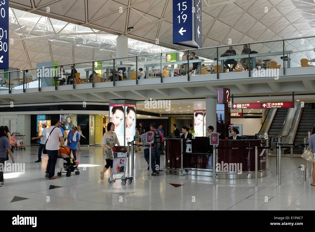 Departure area of Hong Kong International Airport located on the island of Chek Lap Kok. Stock Photo