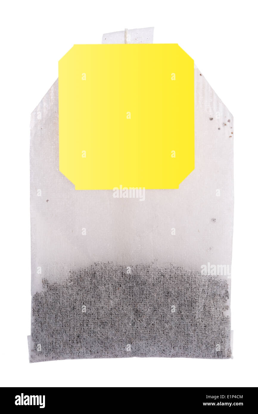 Teabag with yellow label, isolated on white background Stock Photo