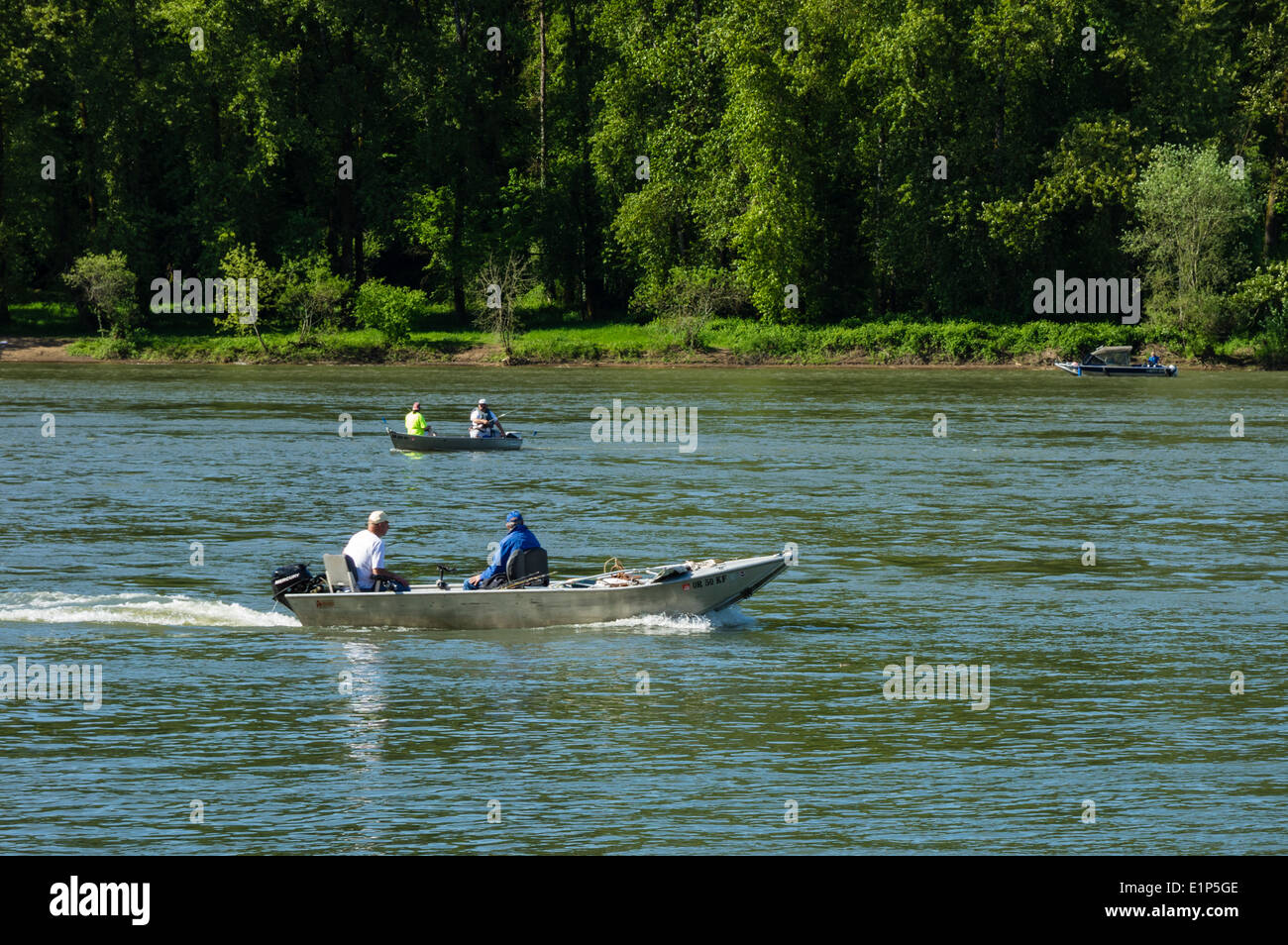 Fishermen and fishing boats on the Willamette River. Portland Oregon