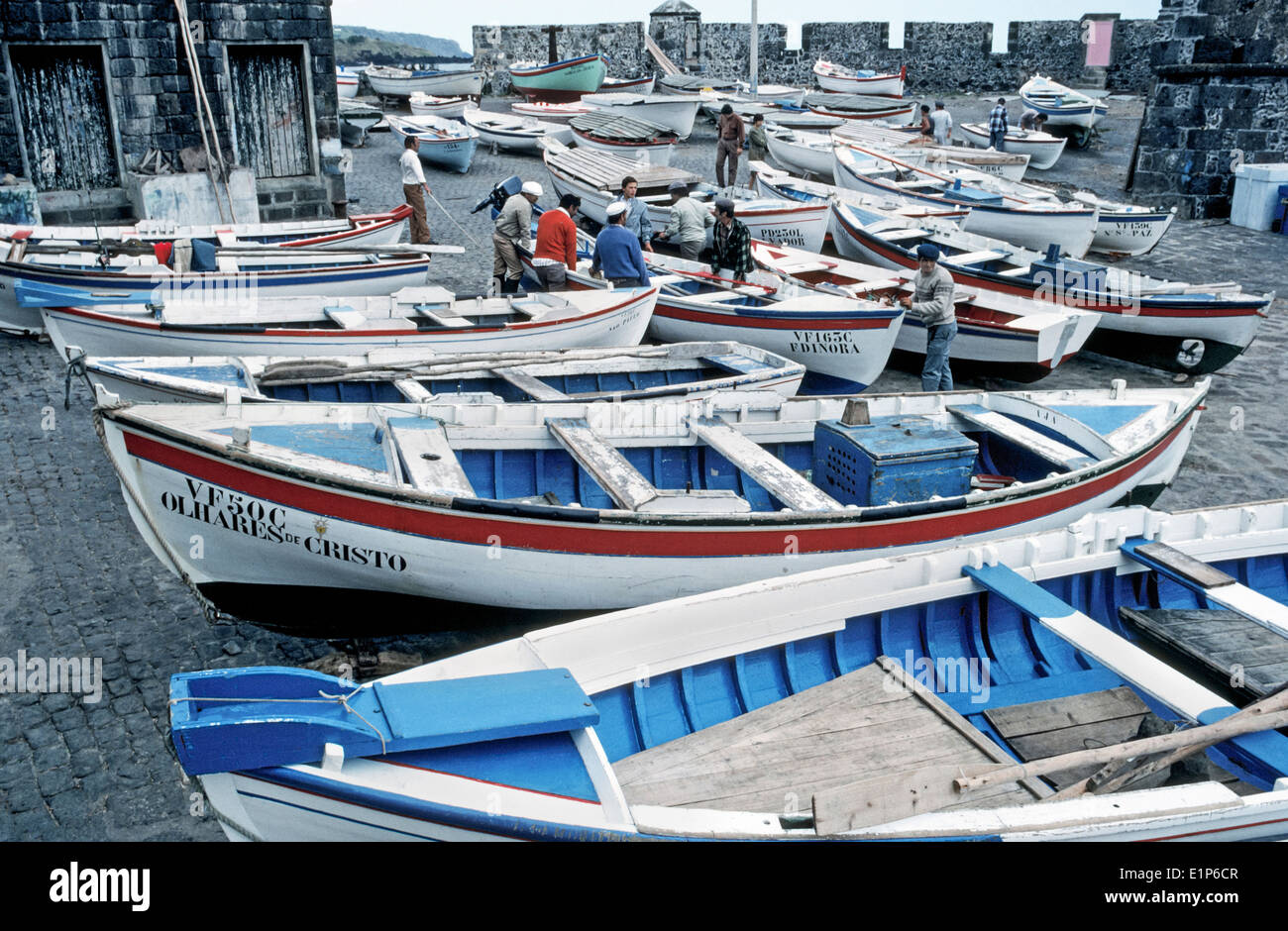 Fishermen prepare their boats at Vila Franca do Campo on Sao Miguel Island in the Azores, an autonomous region of Portugal in the North Atlantic Ocean. Stock Photo