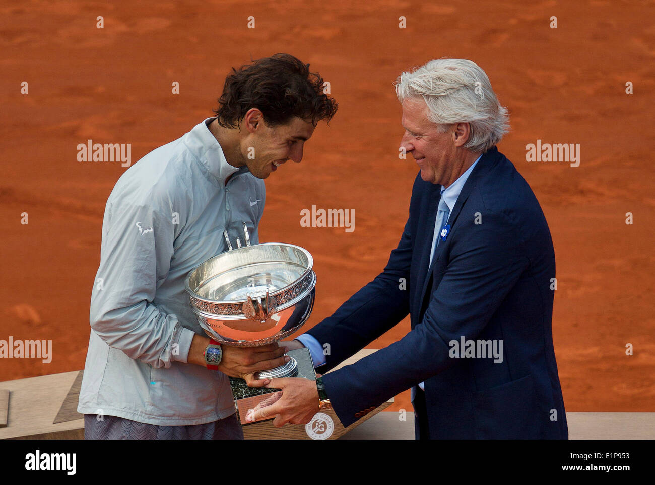 Paris, France. 8th June, 2014. Tennis, French Open, Roland Garros, Final men: Rafael Nadal (ESP) receives the trophy  out of the hands of former winner Bjorn Borg Photo:Tennisimages/Henk Koster/Alamy Live News Stock Photo