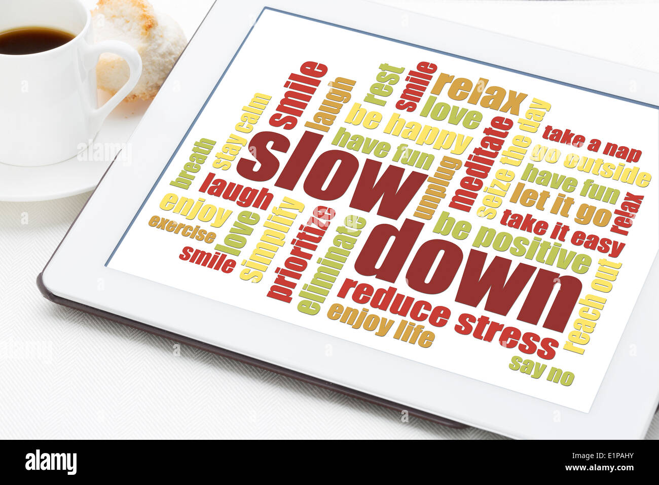 slow down and relax - reducing stress tips in a form of a word cloud on a digital tablet Stock Photo