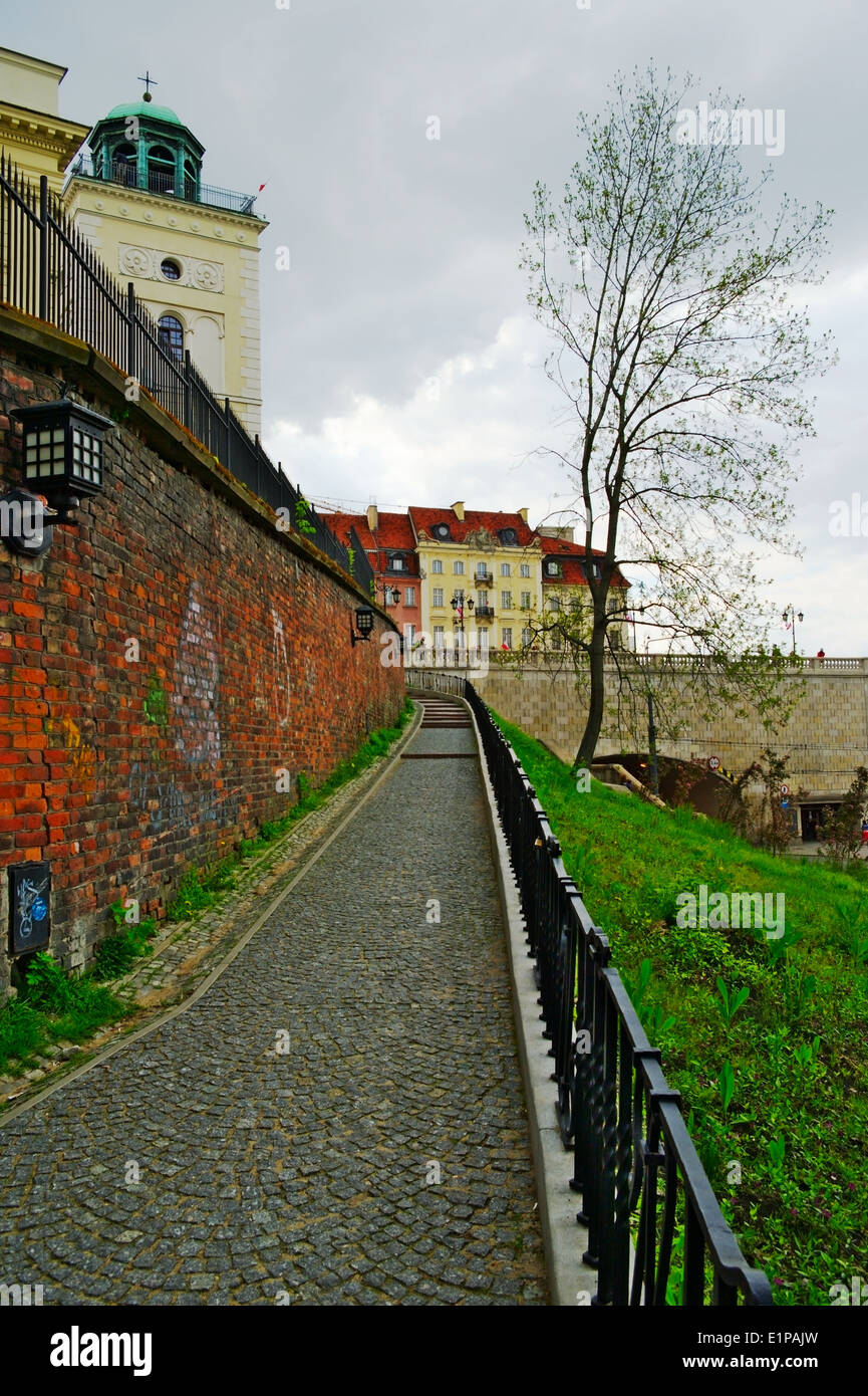 Cobbled alley, Zrodlowa street, alongside the St. Anne Church wall in Warsaw, Poland. Stock Photo