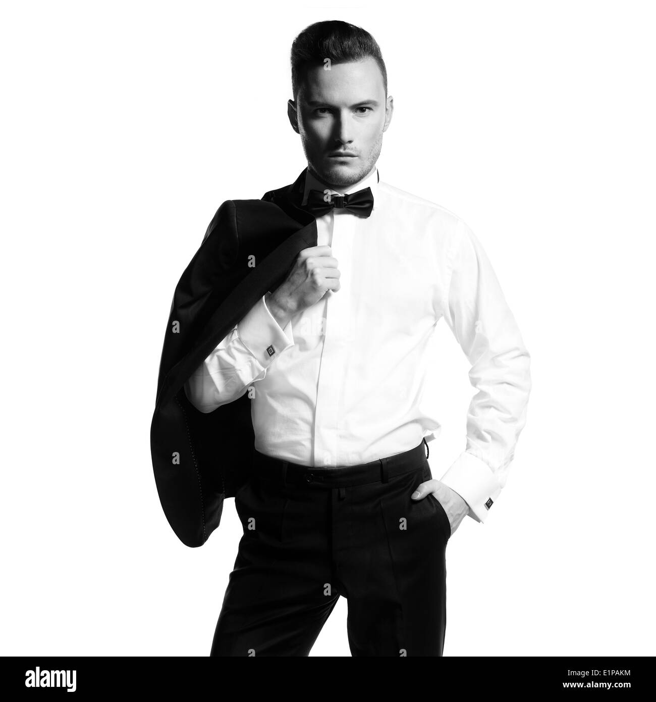 Portrait of handsome stylish man in elegant black suit Stock Photo - Alamy