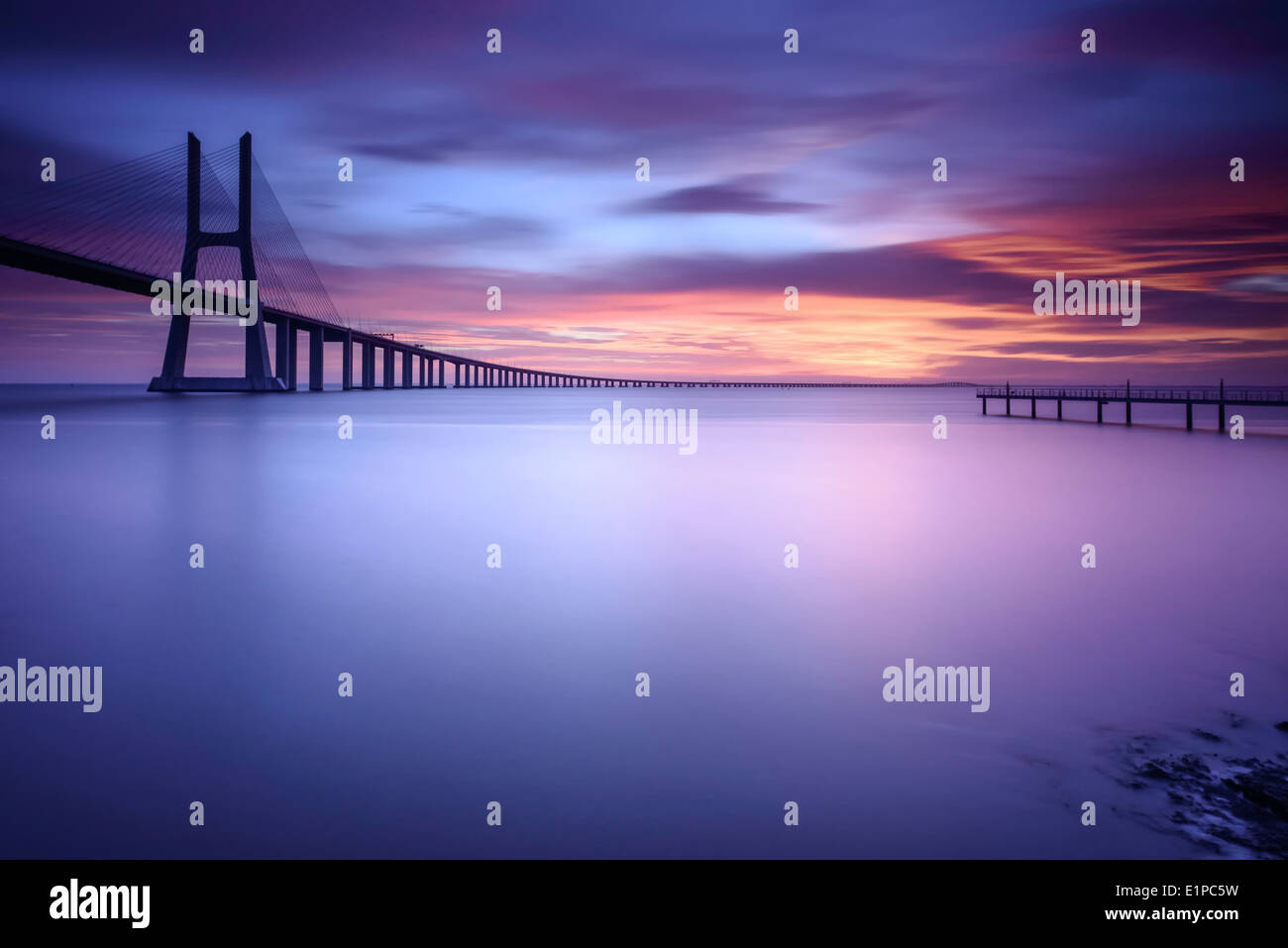 Dawn in Vasco da Gama bridge Stock Photo