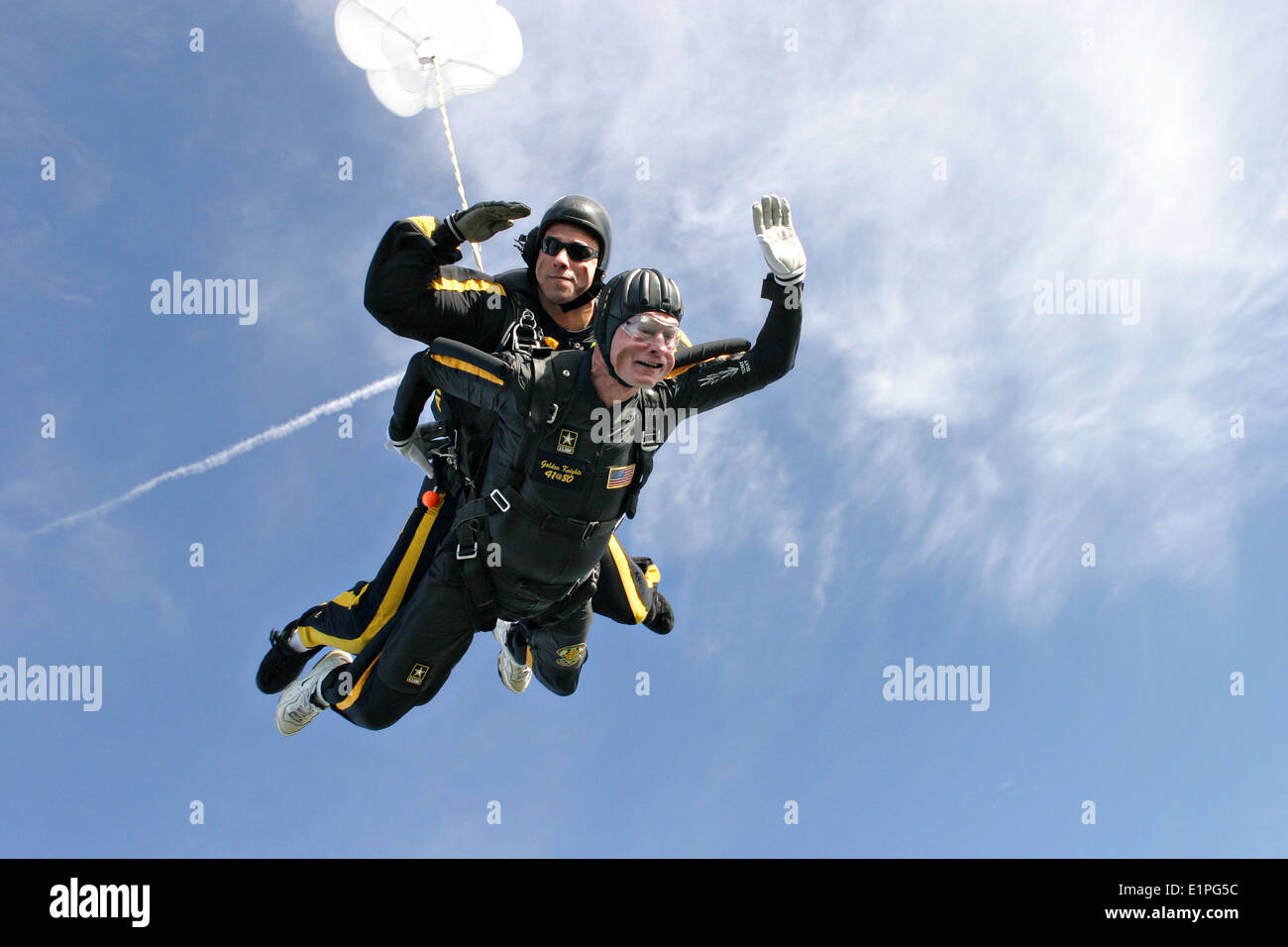 Former President George H.W. Bush marks his 80th birthday with a tandem jump with the US Army Golden Knights Parachute Team June 14, 2004 in College Station, Texas. Stock Photo