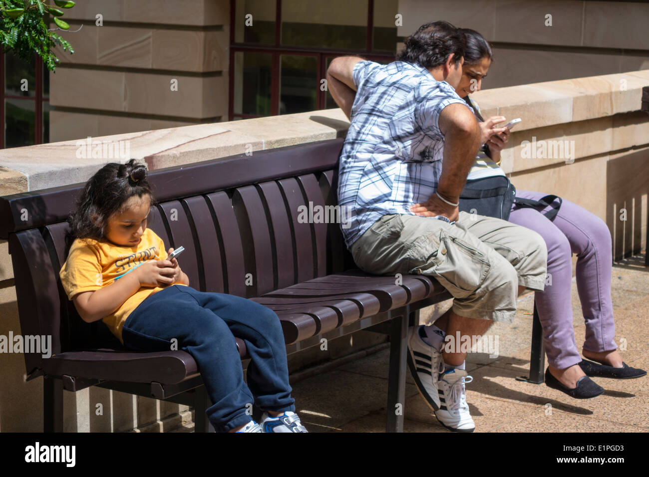 Brisbane Australia CBD,Ann Street,Asian girl girls,female kids children daughter,man men male,father,woman female women,mother,family families child c Stock Photo