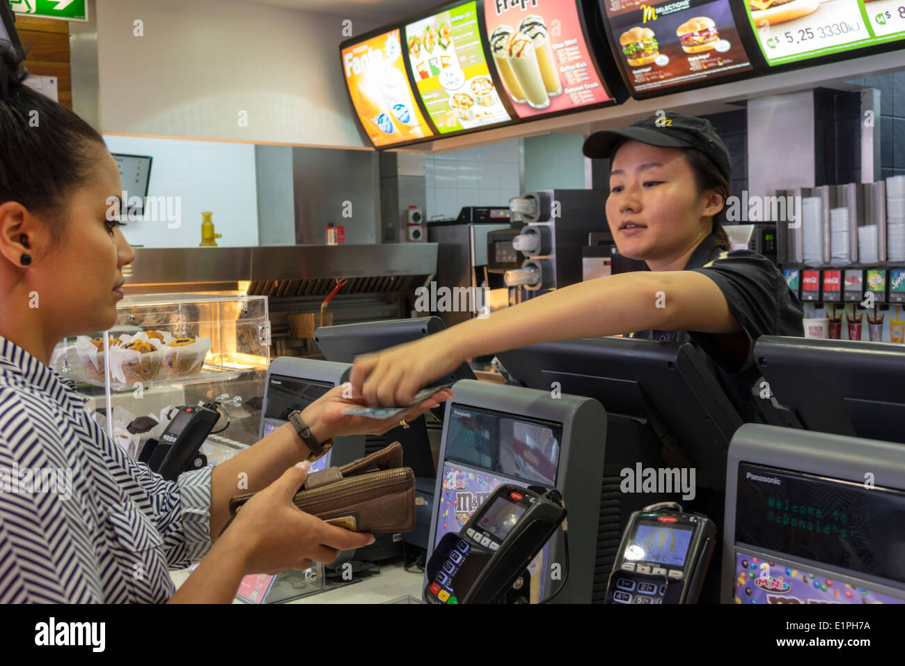 Brisbane Australia,Fortitude Valley,Chinatown,McDonald's,burgers,hamburgers,fast food,restaurant restaurants dining cafe cafes,Asian woman female wome Stock Photo