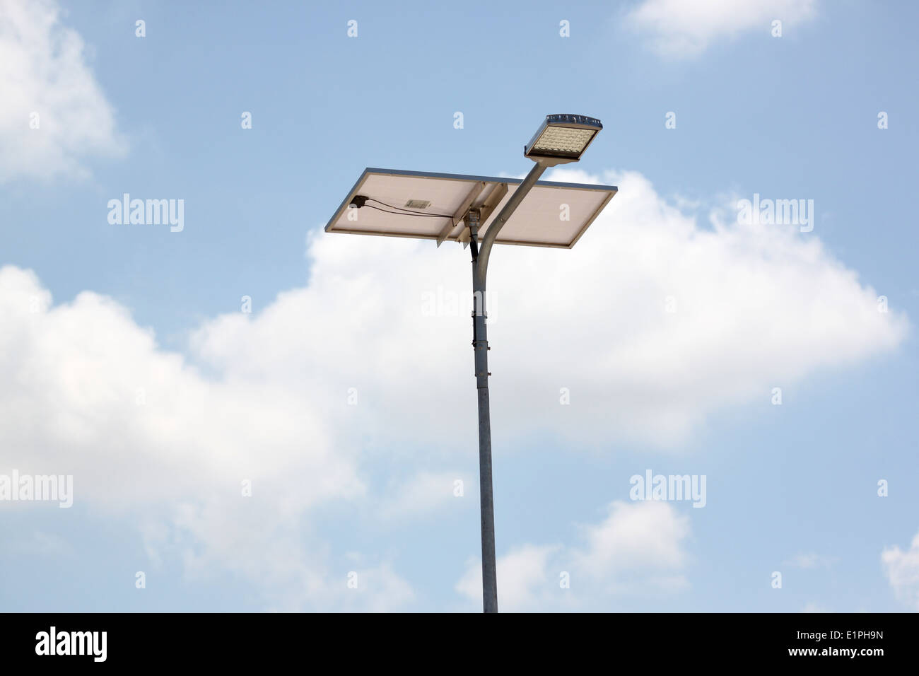 Solar Cell Panel and lanterns street on blue sky background. Stock Photo