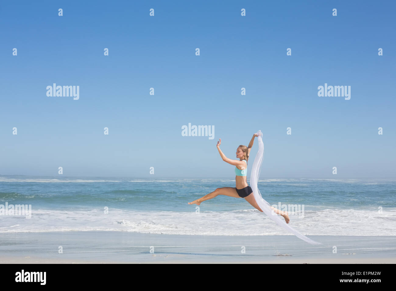 Fit woman jumping hi-res stock photography and images - Alamy