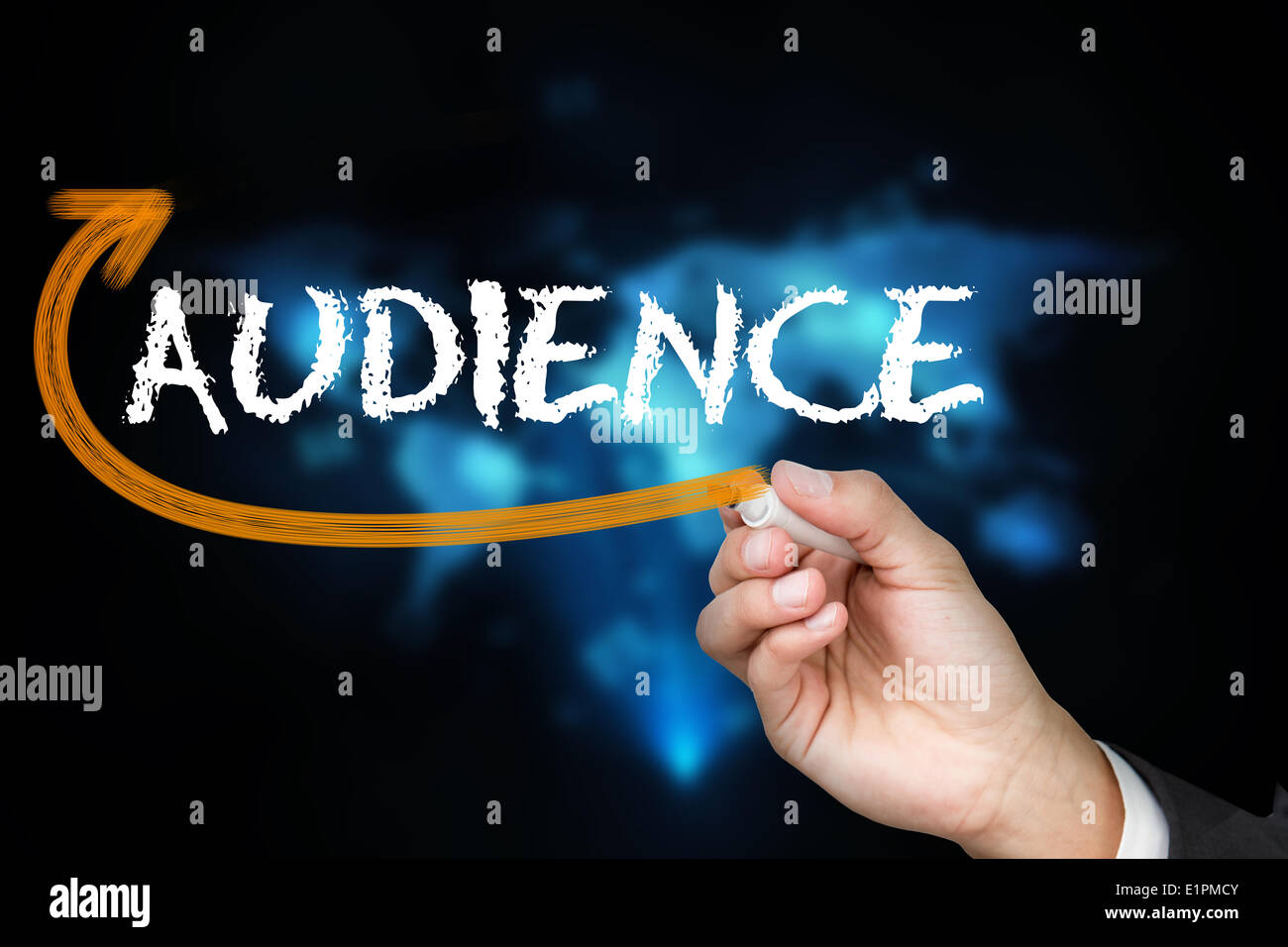 Businessman writing the word audience Stock Photo Alamy