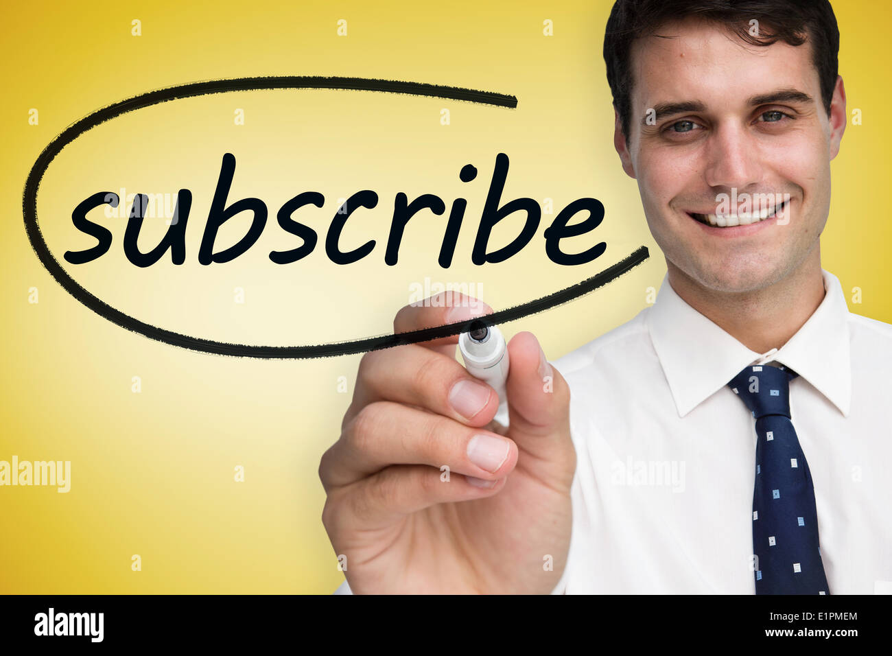 Businessman writing the word subscribe Stock Photo