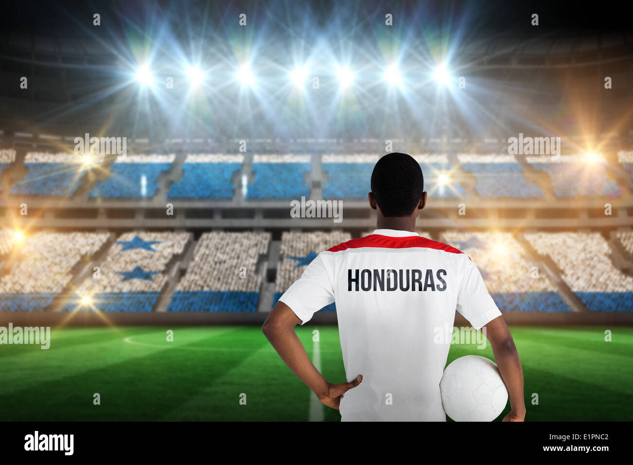 Composite image of honduras football player holding ball Stock Photo