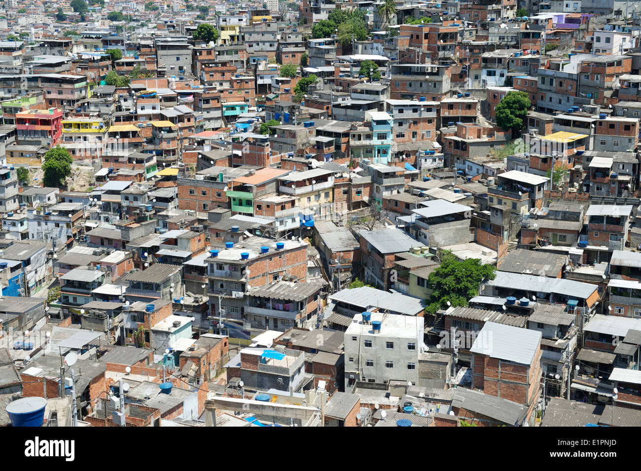 Favela Brazilian shantytown covers the hillside in Rio de Janeiro Brazil Complexo Alemao Stock Photo
