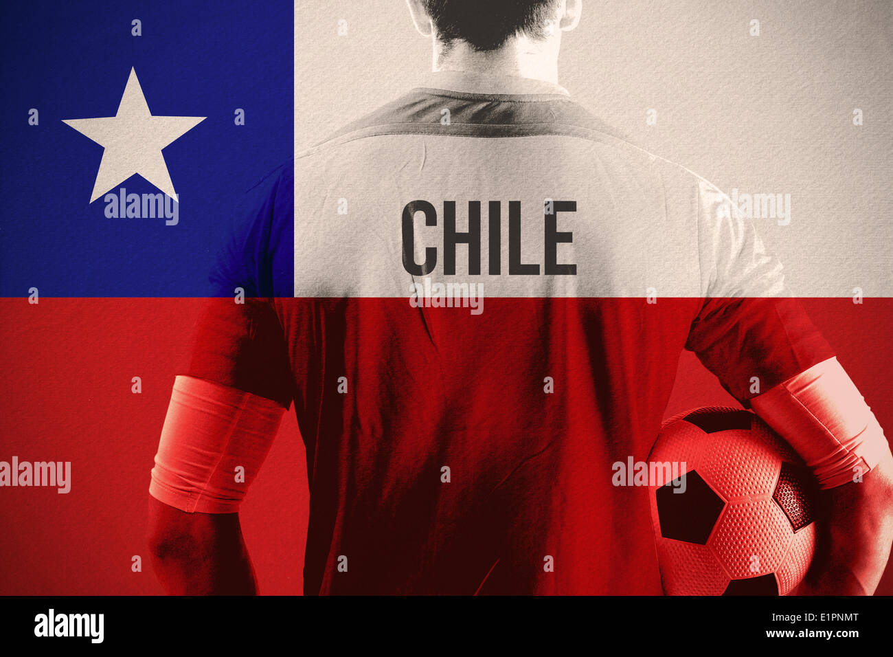Composite image of chile football player holding ball Stock Photo