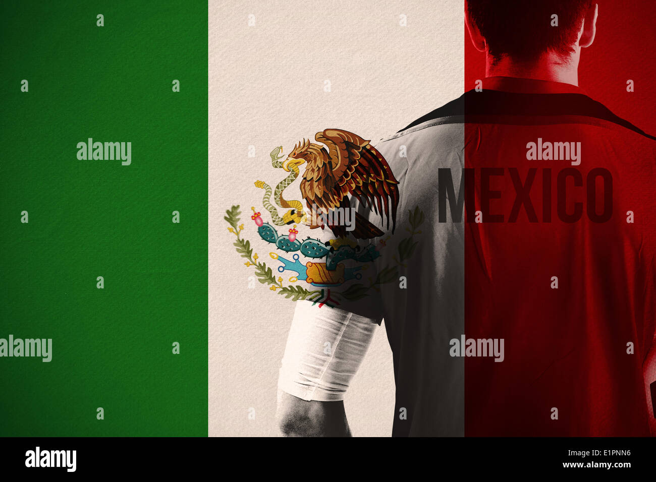 Composite image of mexico football player holding ball Stock Photo