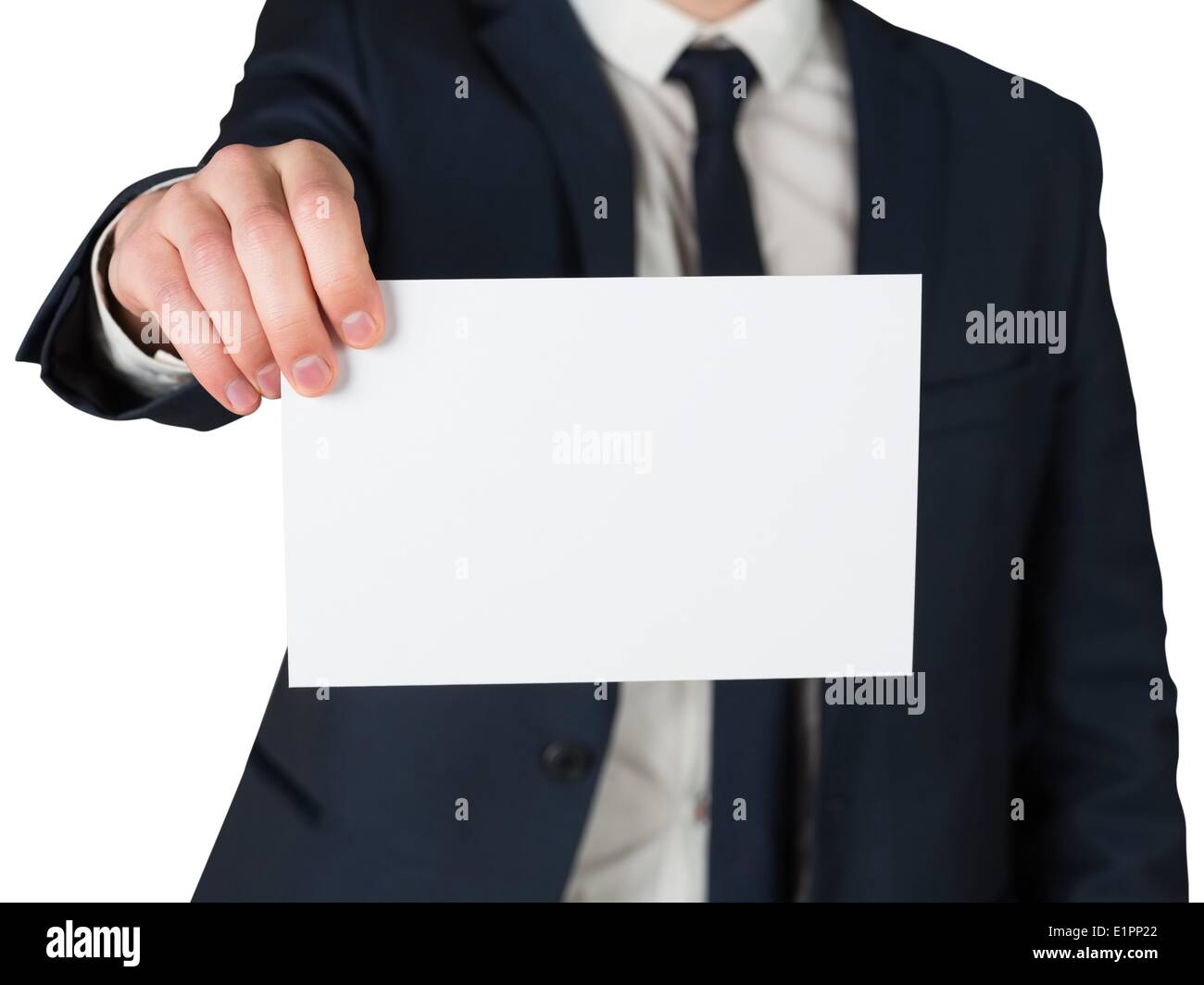 Businessman showing card to camera Stock Photo