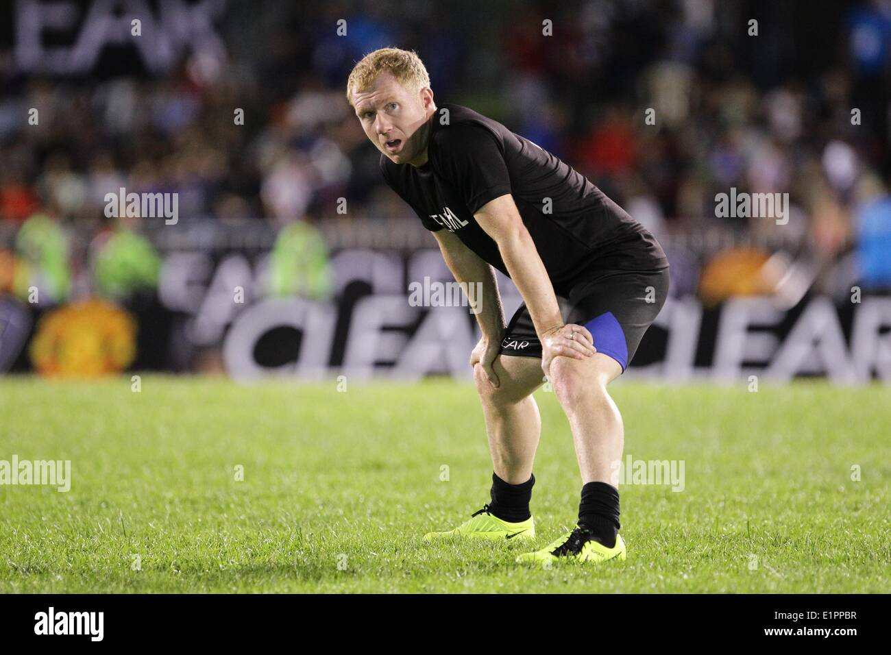 Manila, Philippines. 7th June, 2014. Makati, Philippines - Former Manchester United player Paul Scholes warms up before an exhibition game against local amatuer and professional players in Makati, east of Manila on June 7, 2014. © Mark Cristino/NurPhoto/ZUMAPRESS.com/Alamy Live News Stock Photo
