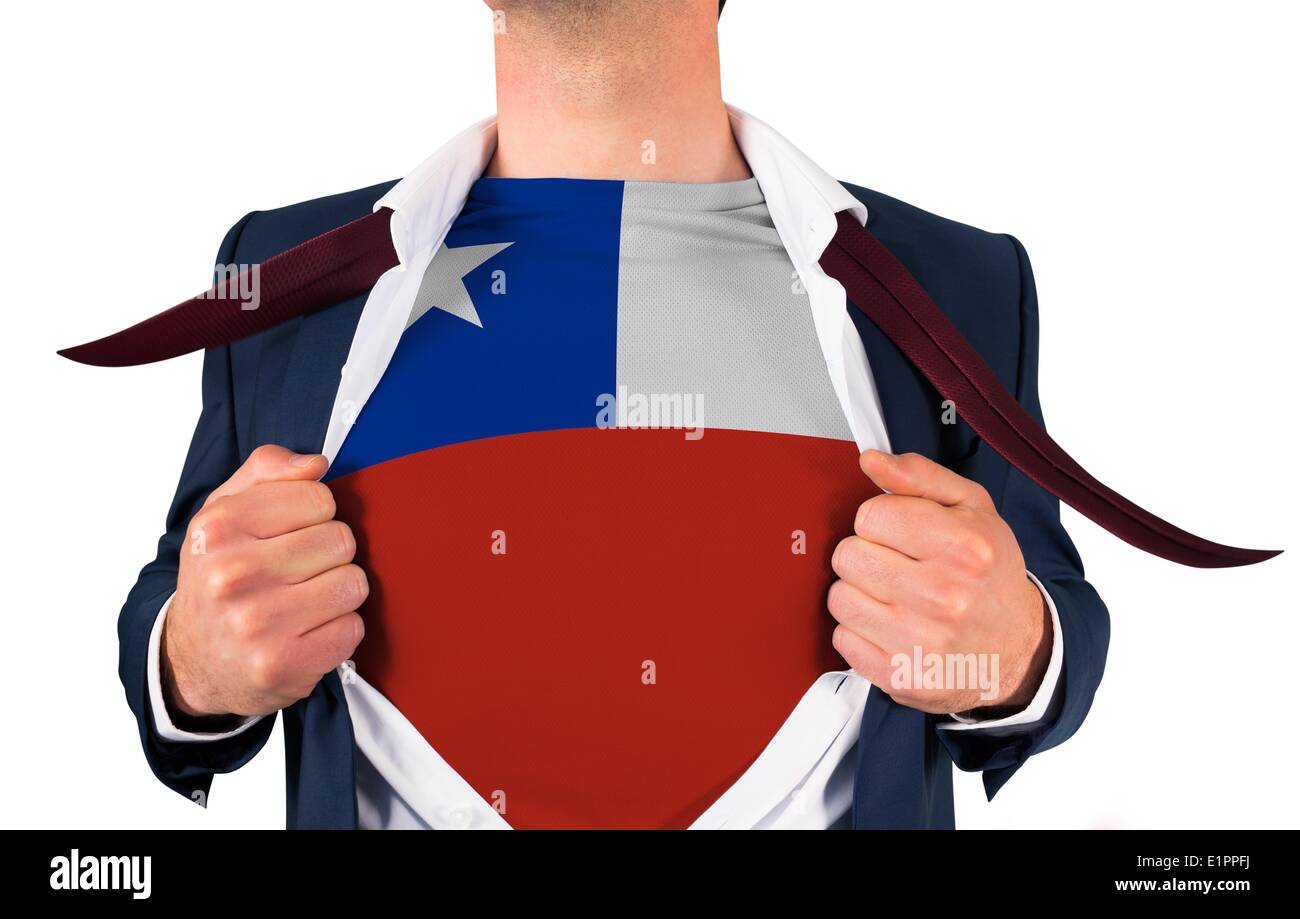 Businessman opening shirt to reveal chile flag Stock Photo