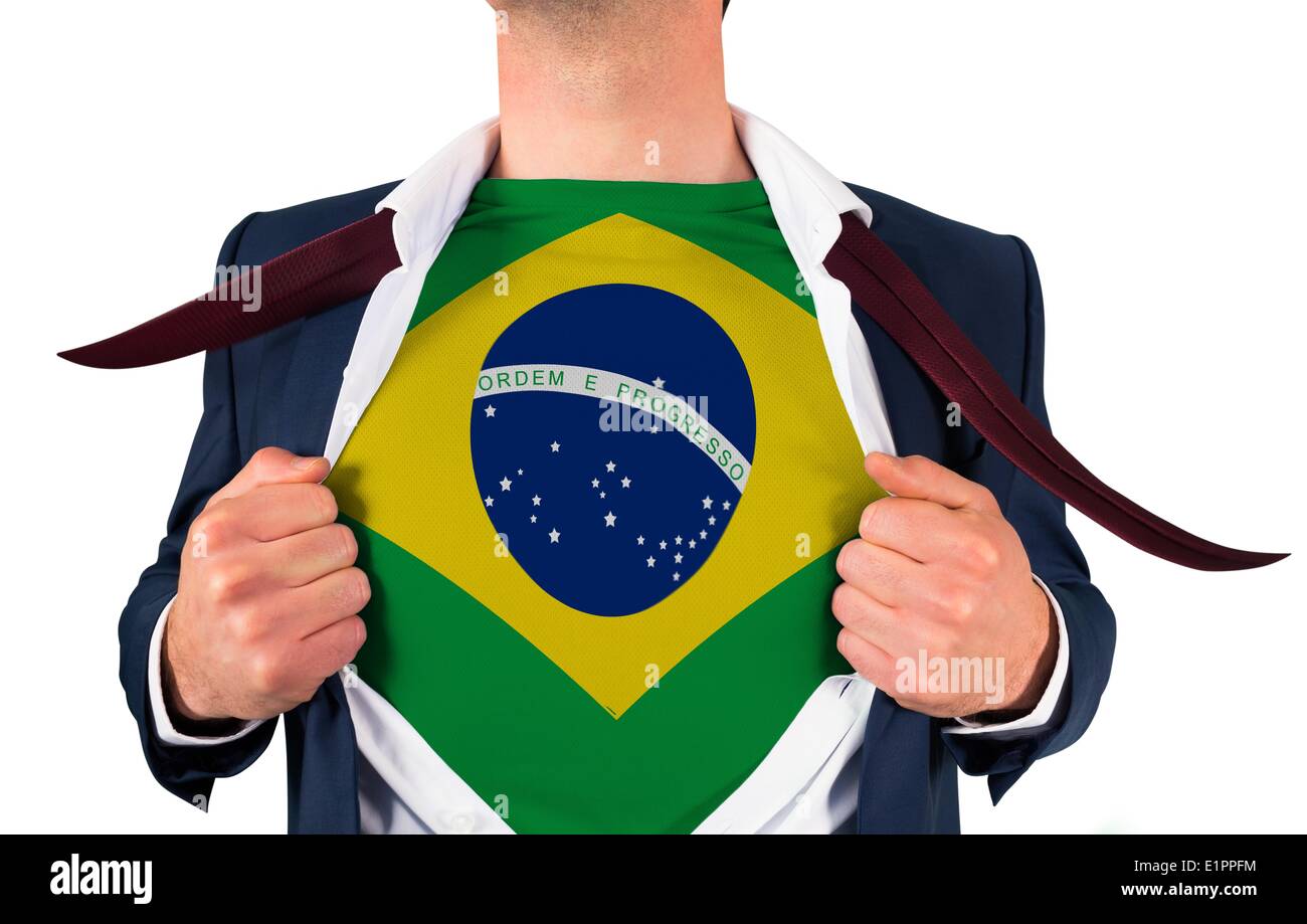 Businessman opening shirt to reveal brasil flag Stock Photo