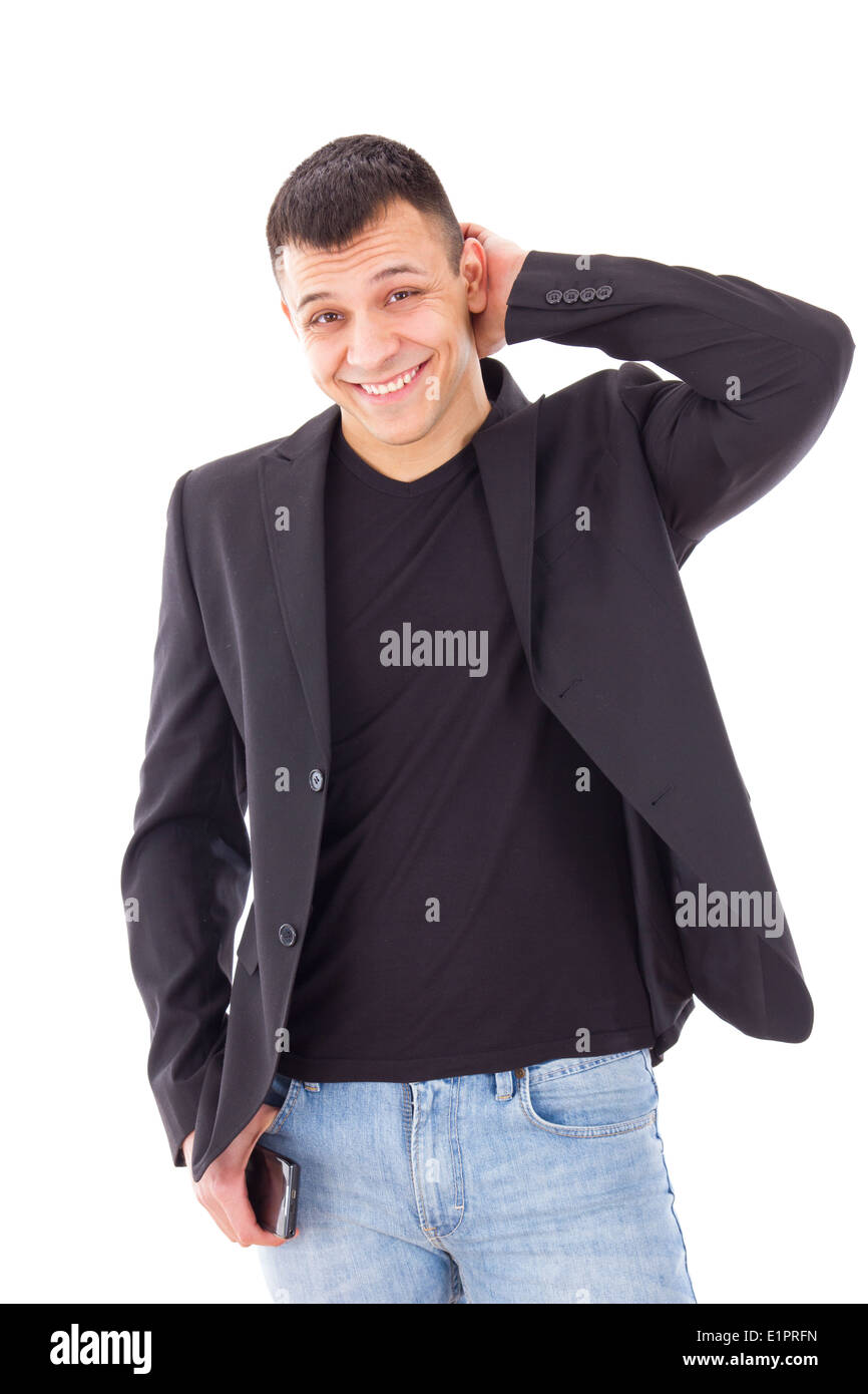 smiling casual shy man in a black suit jacket and jeans Stock Photo