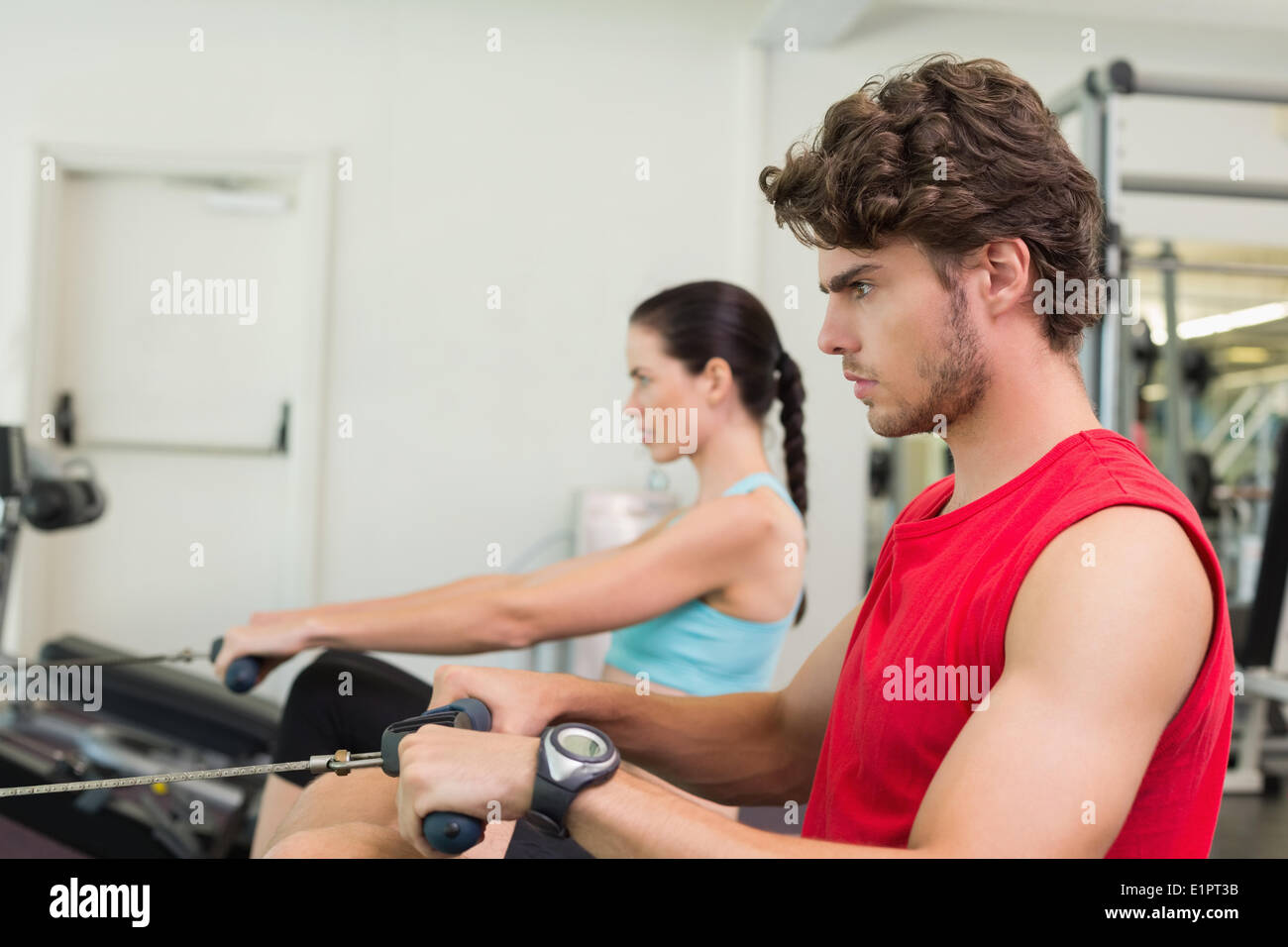 Focused woman rowing machine hi-res stock photography and images - Alamy