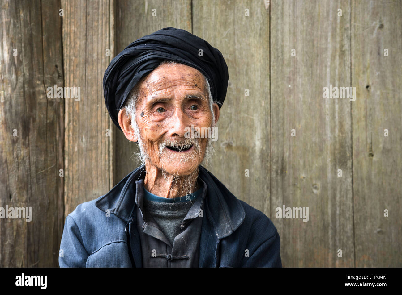 An elderly member of the Yao minority people in Tiantou Village, Guangxi, China. Stock Photo