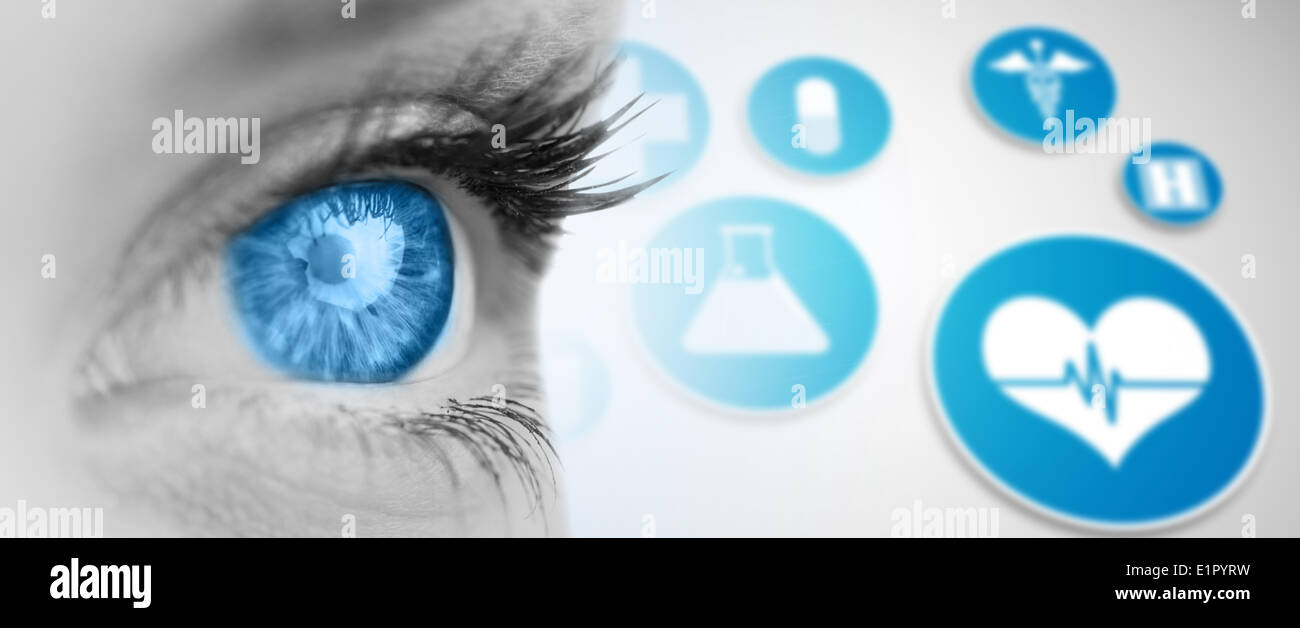 Composite image of blue eye on grey face Stock Photo