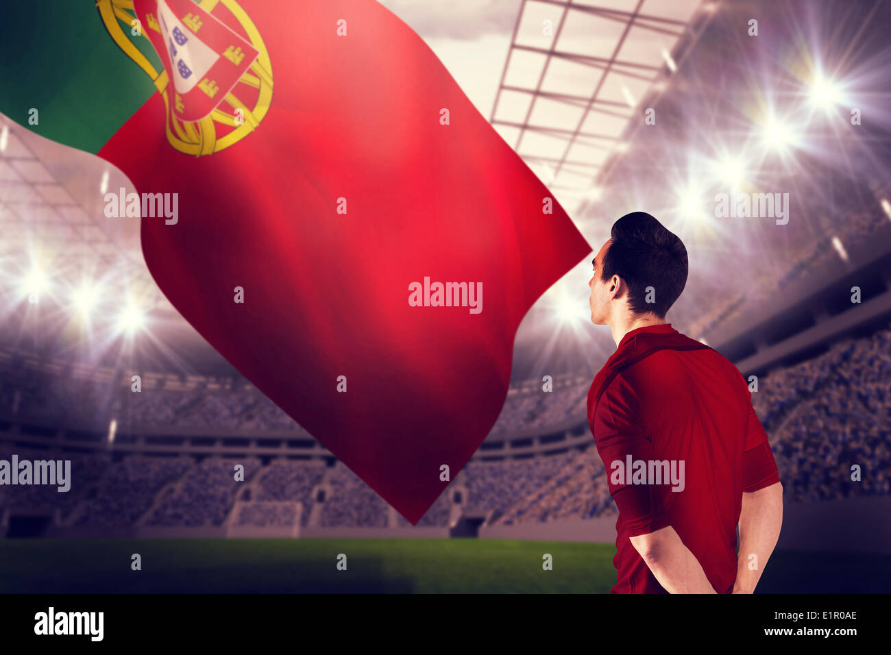Composite image of football player in red jersey Stock Photo
