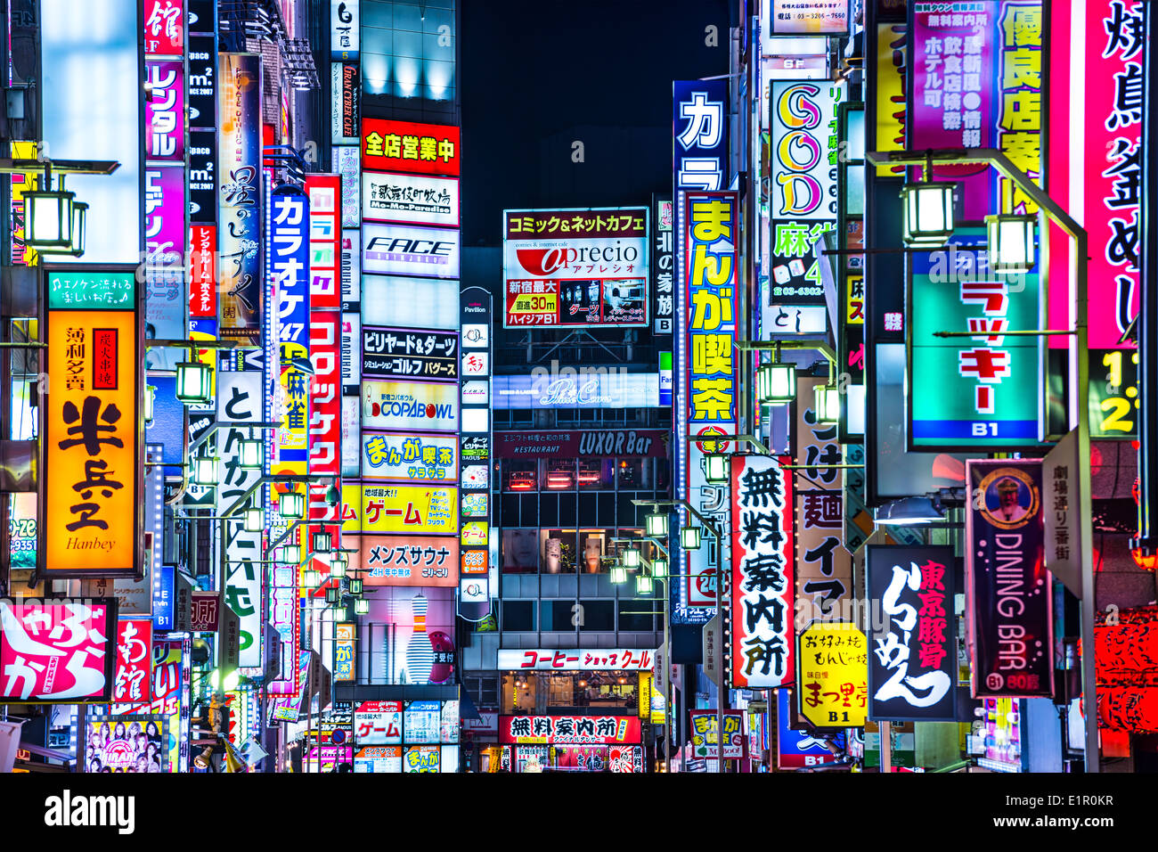 Shinjuku, Tokyo, Japan lit advertisements at Kabuki-cho District. Stock Photo