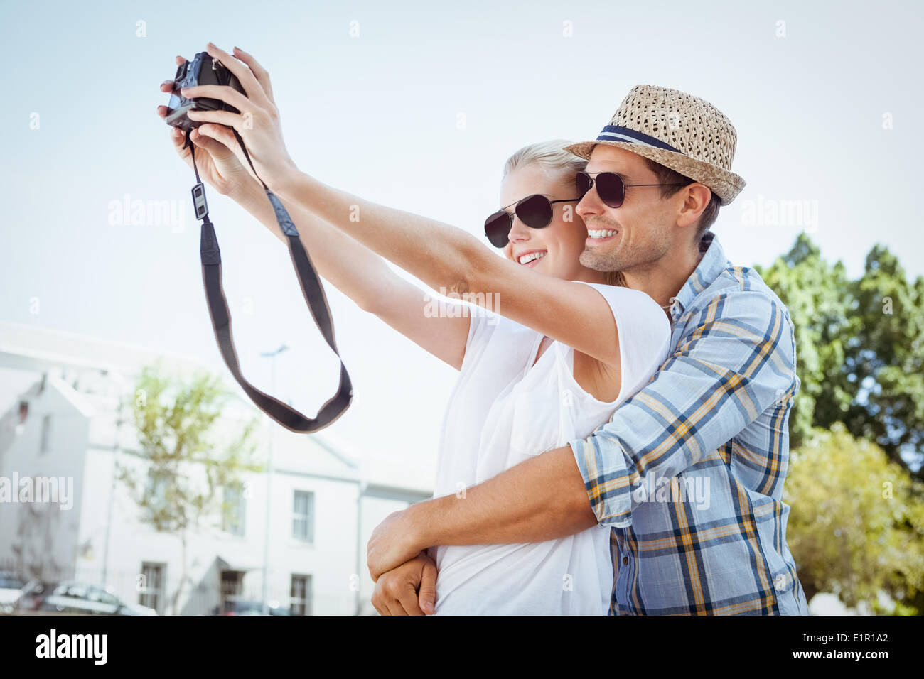 Stylish young couple taking a selfie Stock Photo