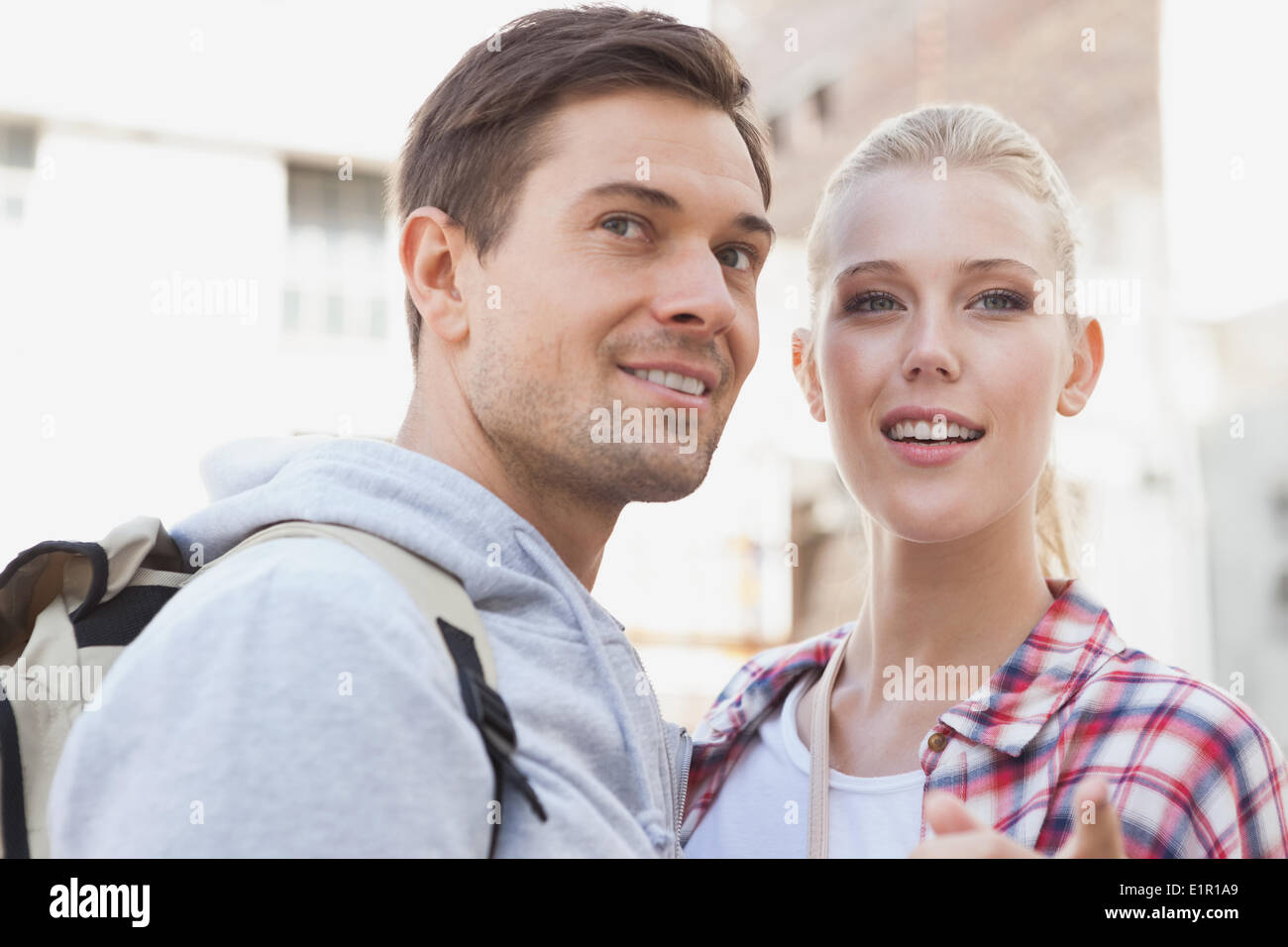 Young tourist backpack smiling hi-res stock photography and images - Alamy